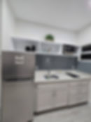 Compact Modern Kitchenette with Stainless Steel Appliances
