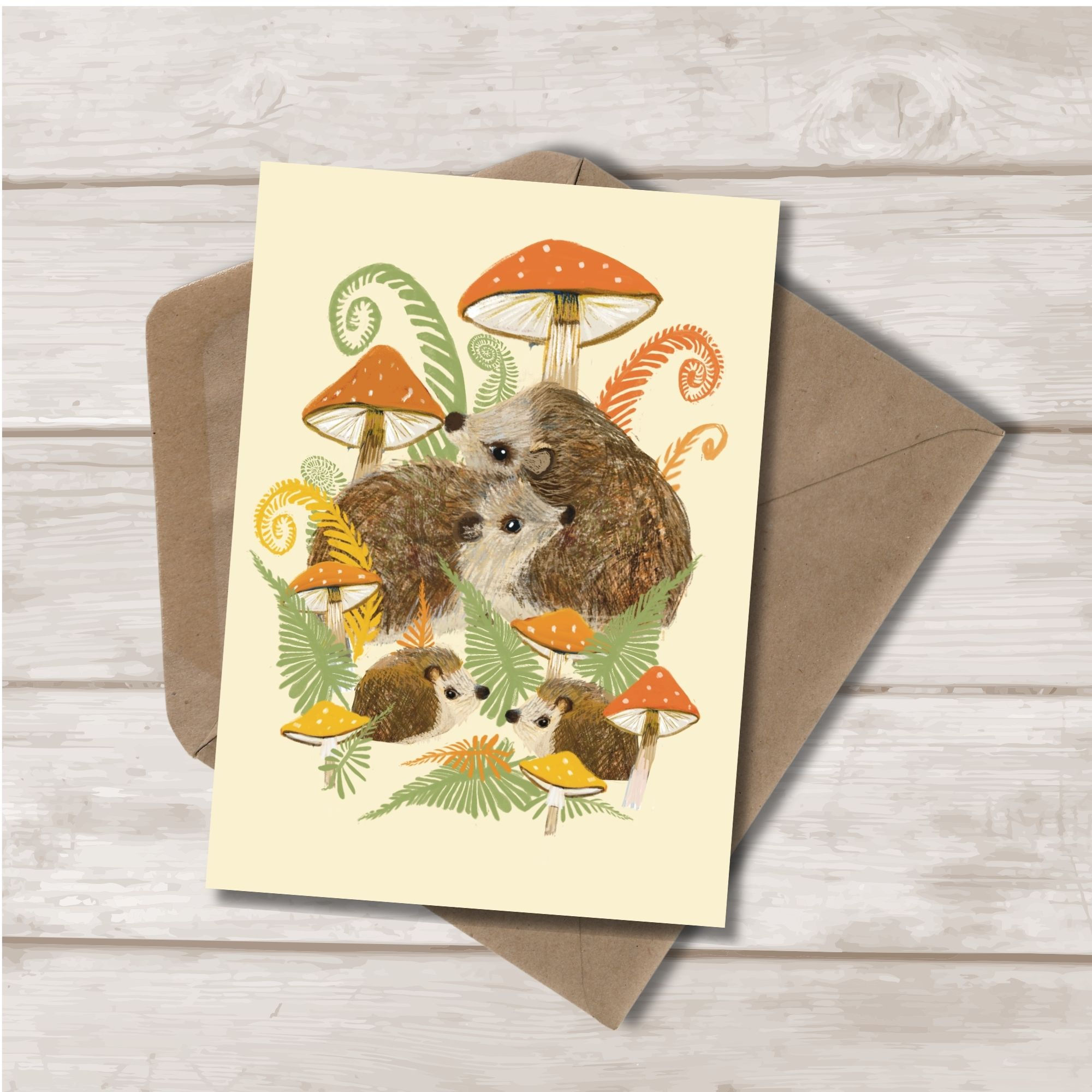A family of hedgehogs amongst toadstools