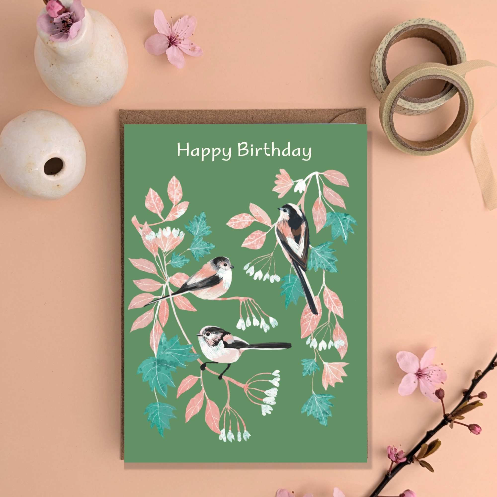 Illustration three longtailed tits in blossoms deep green background