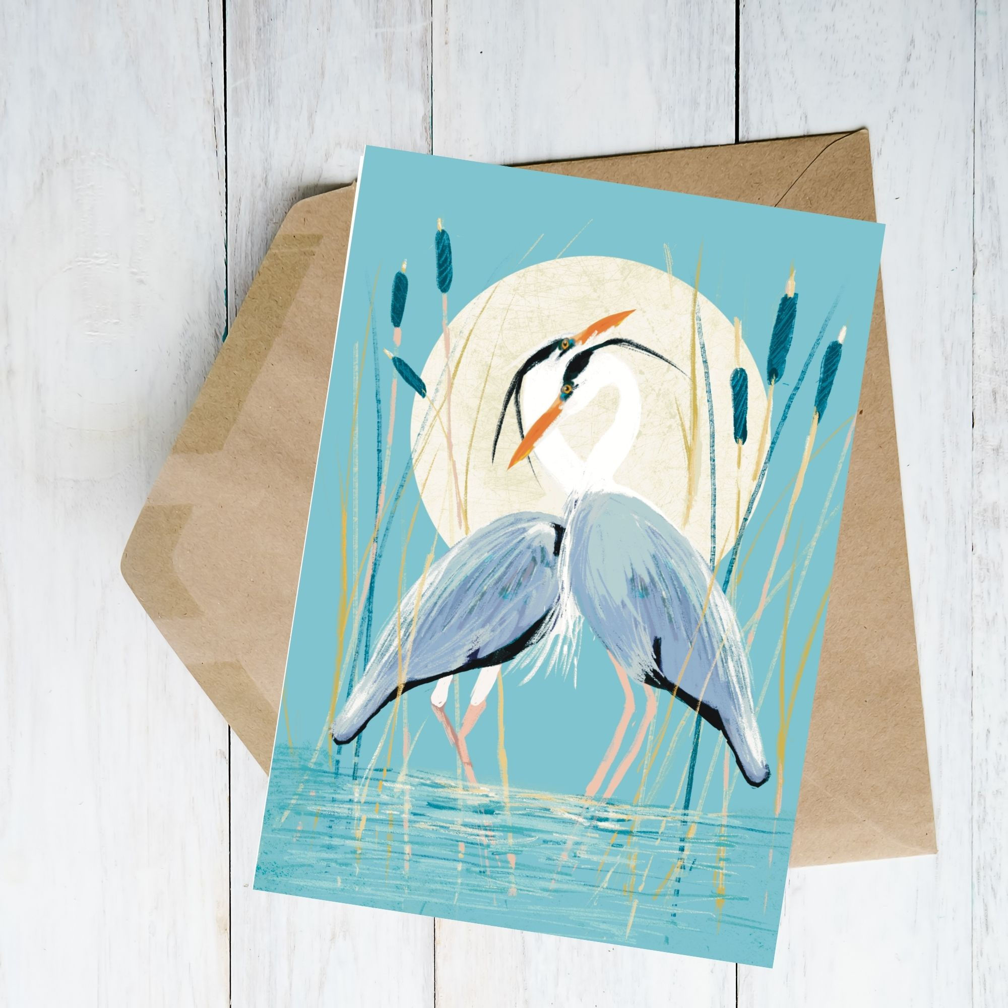 Pair of grey herons necks entwined reeds and large mooc in background