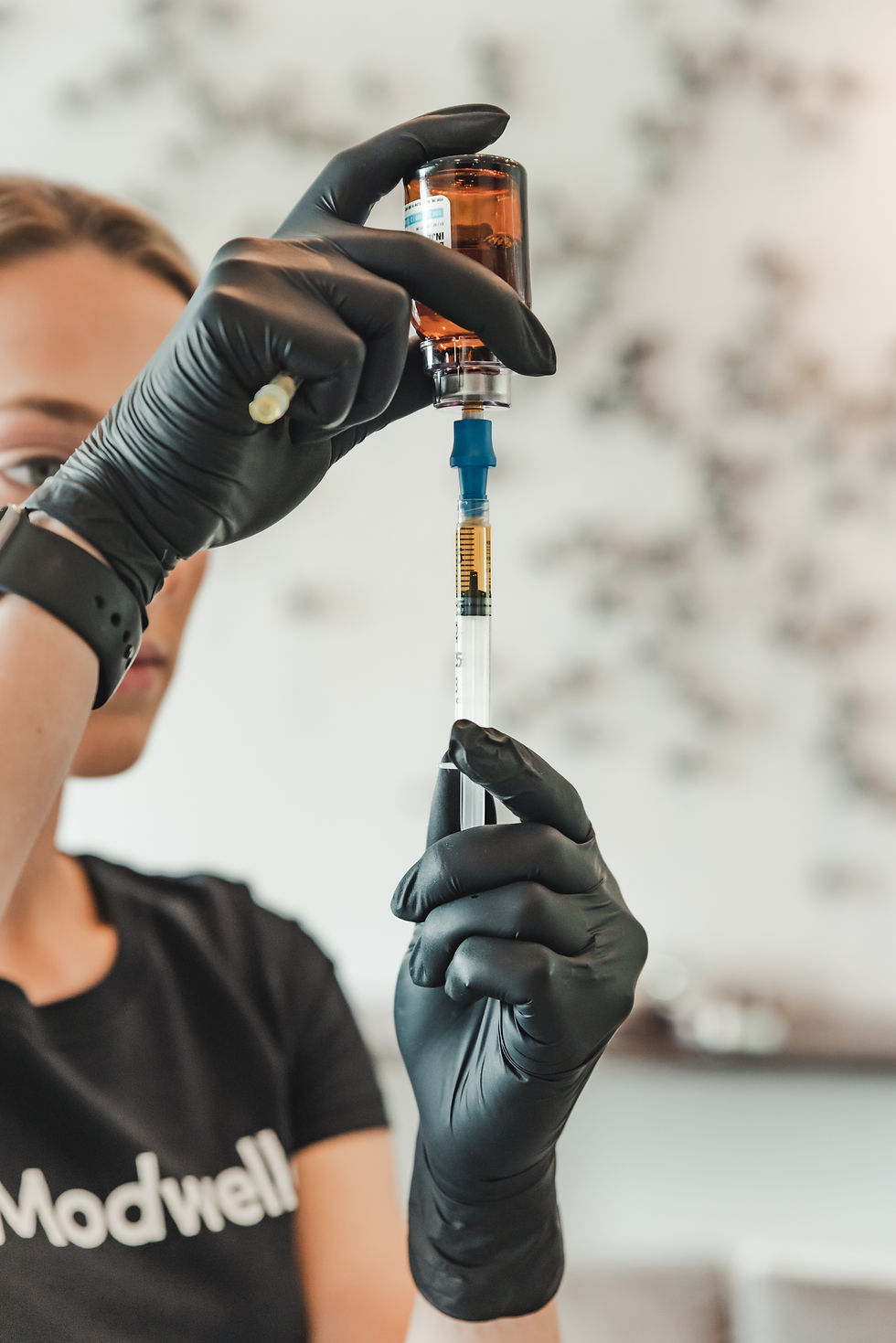 Nurse drawing up stem cells.jpg