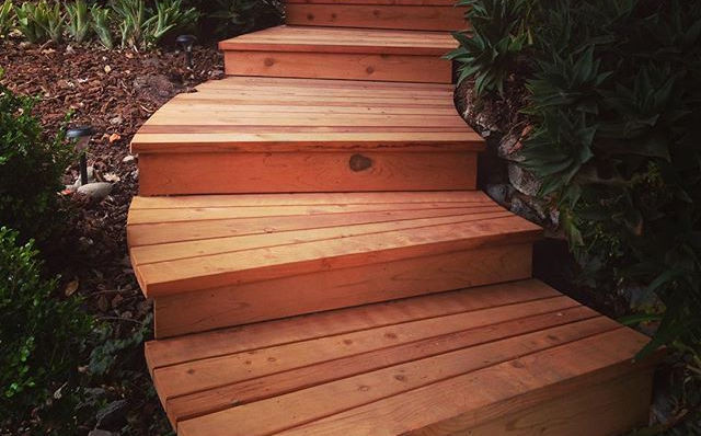 Curved redwood stairs_#coyotedesigns #customcarpentry #craftsman #santacruz #customstairs