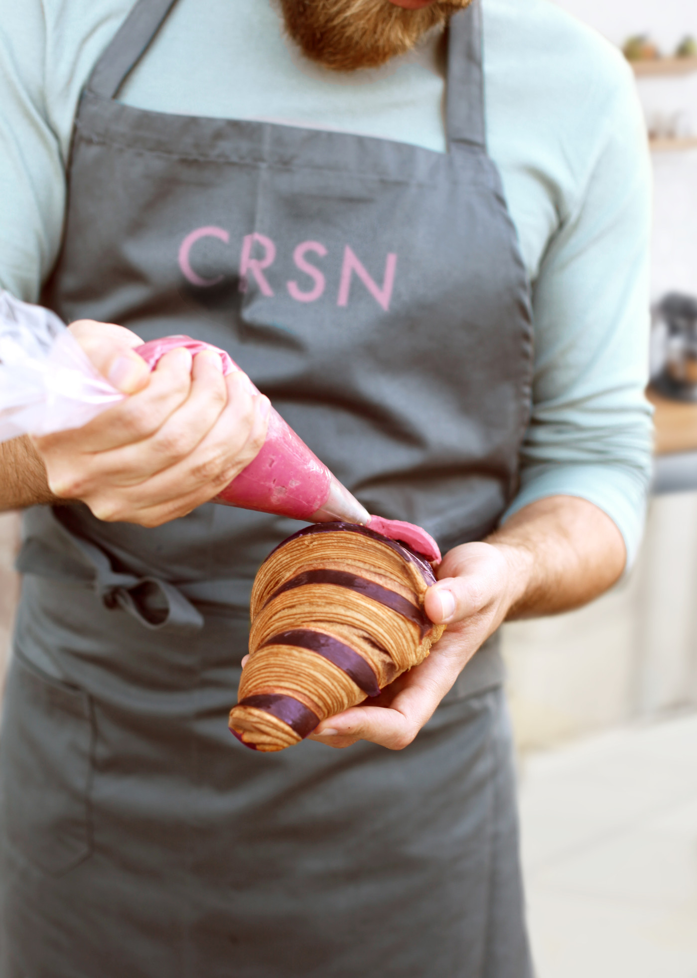 Exquisite French pastries and piping techniques showcased in a Parisian-style cafe setting