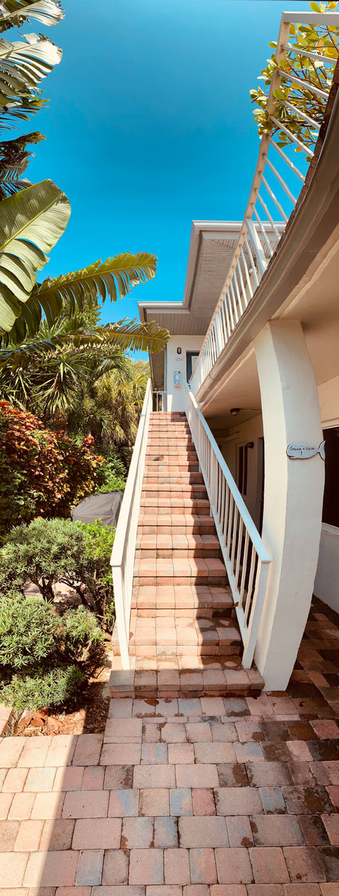 Stairs to the second floor of the property