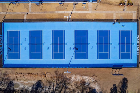 Top-down view of resurfaced tennis courts at Auburn University Yarbrough Tennis Center