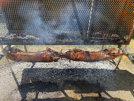 COCHON DE LAIT CUIT A LA BROCHE.jpg