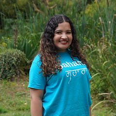 Simran Aluwalia wearing a Sahara Wellbeing t-shirt.