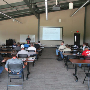 Large group in a classroom.