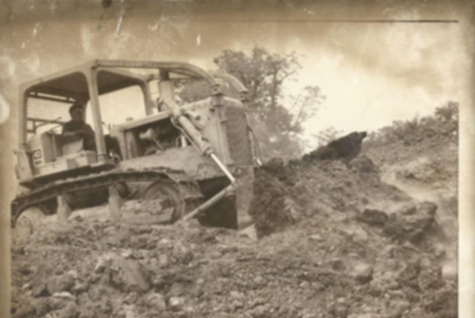A dozer pushing dirt.