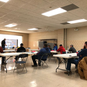 Large group in a classroom.