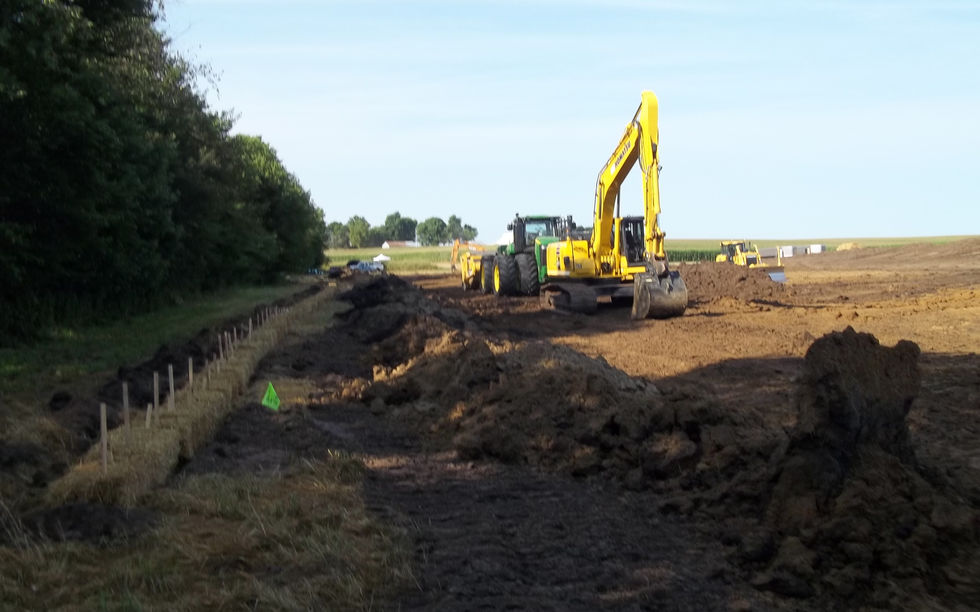 Heavy equipment moving dirt