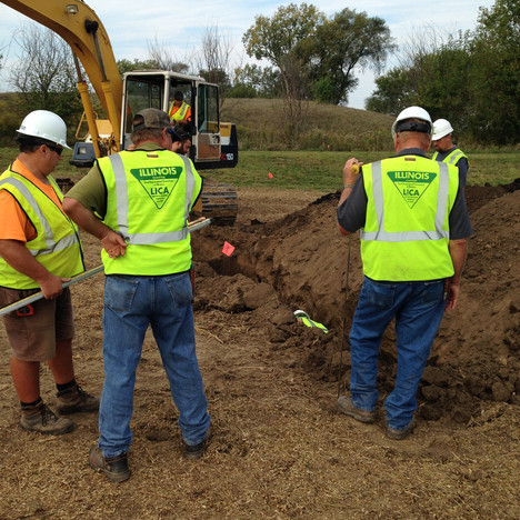 Men digging in the dirt
