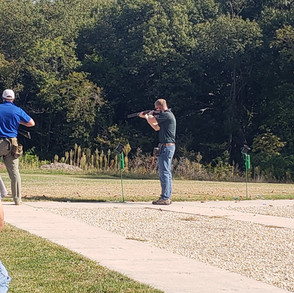 Men shooting guns