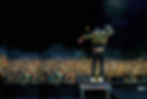 Singer on stage for a corporate event photographer in New Zealand.
