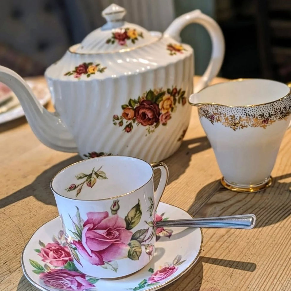 Pretty tea cup and tea pot, afternoon tea at Edensor Tea Cottage, Peak District