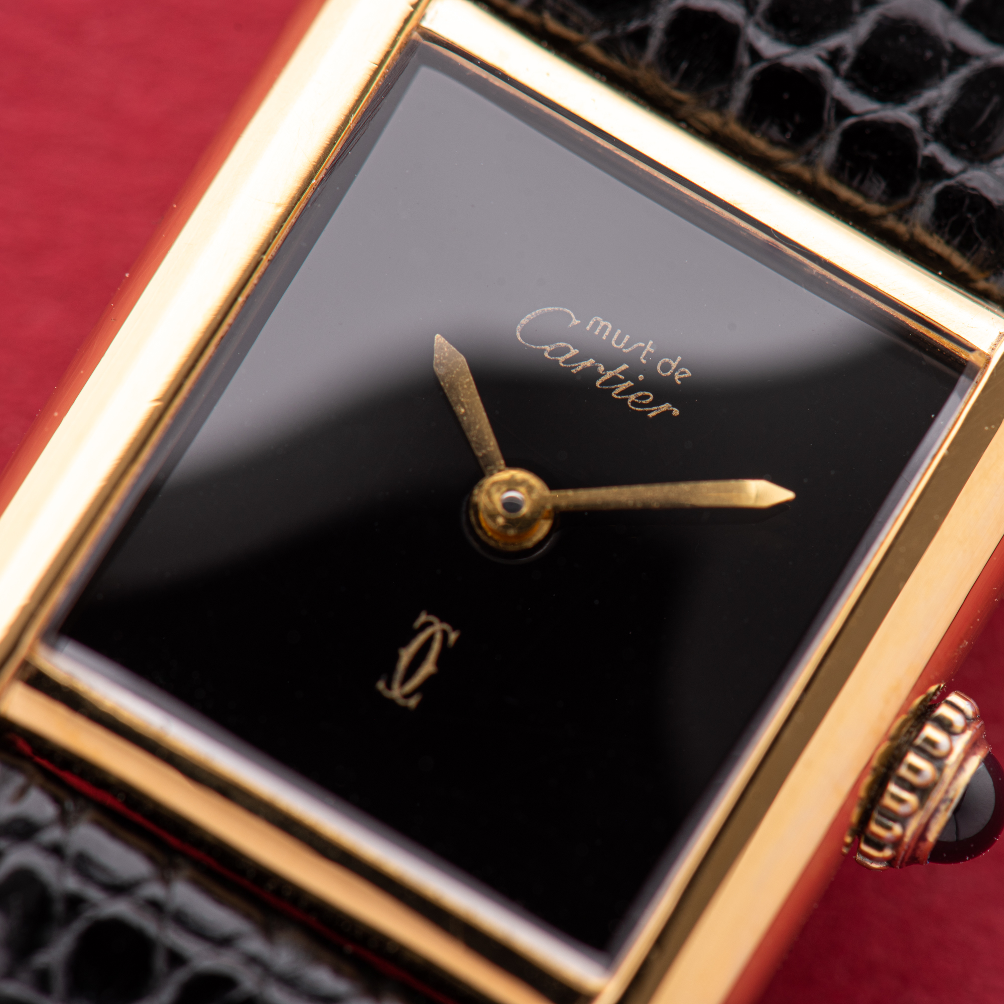 View of Cartier Must de Tank de Must Vermeil PM Onyx Black Spider Dial