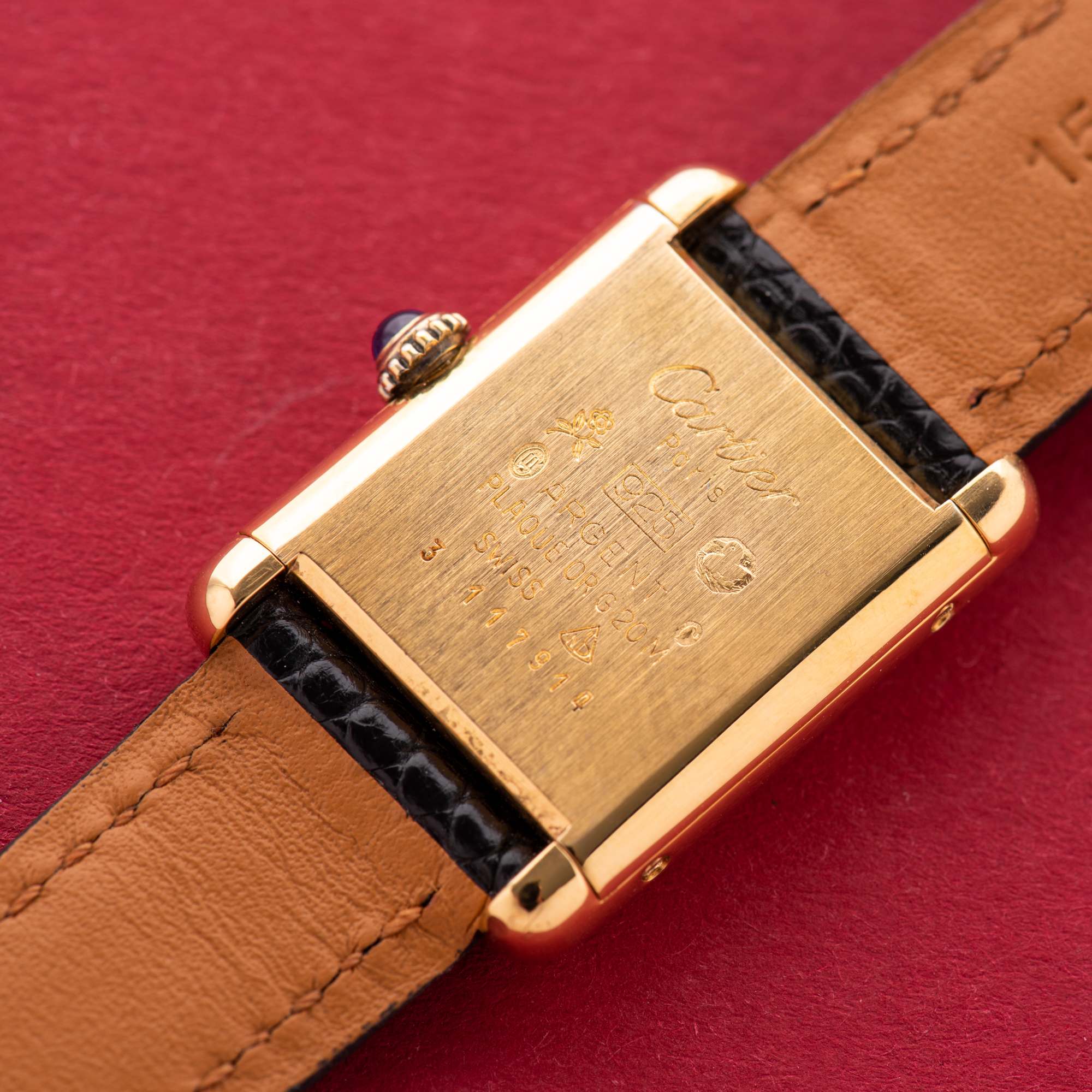 View of Cartier Must de Tank de Must Vermeil PM Onyx Black Spider Dial