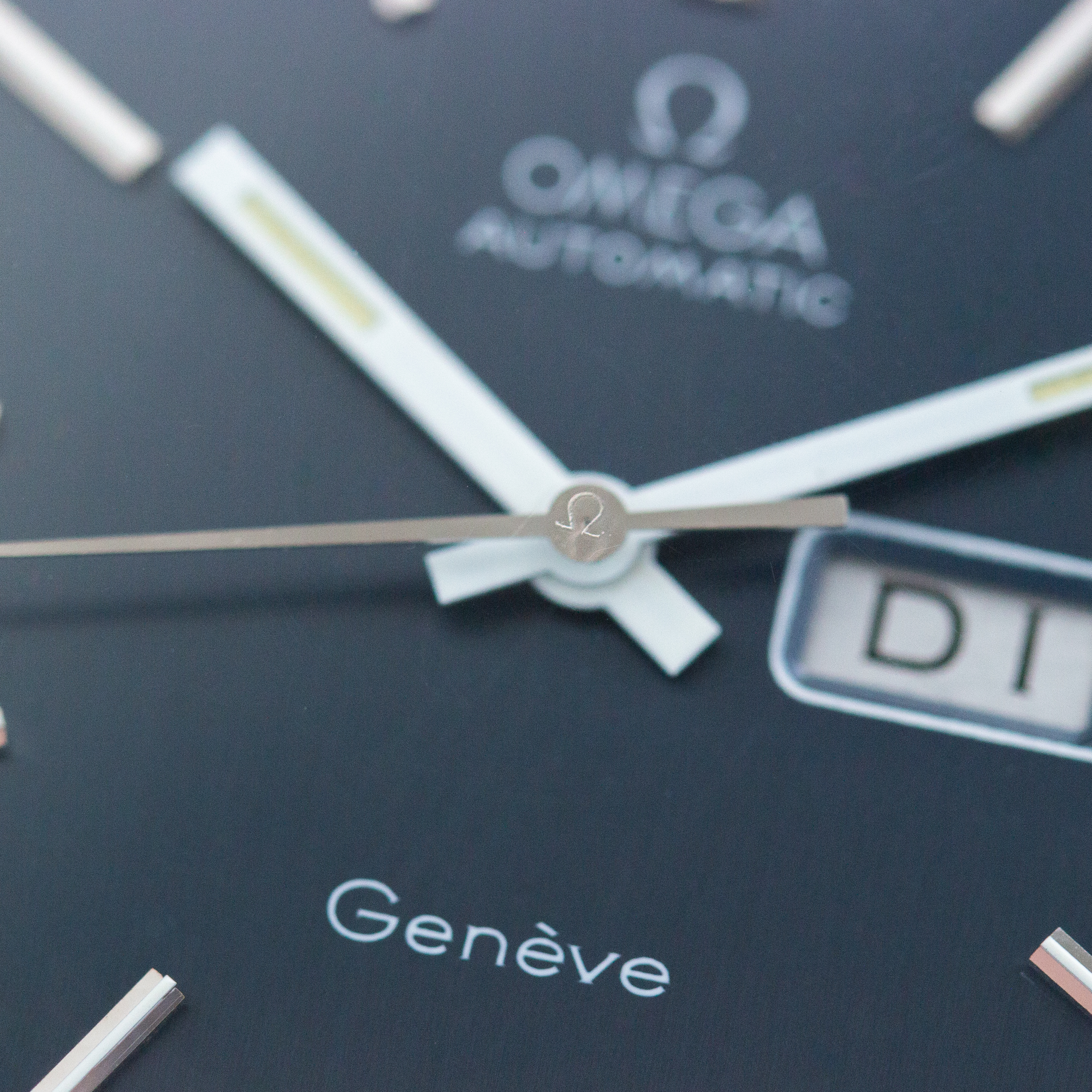 Vue de Omega Genève Automatic Blue Day Date réf 166 0169