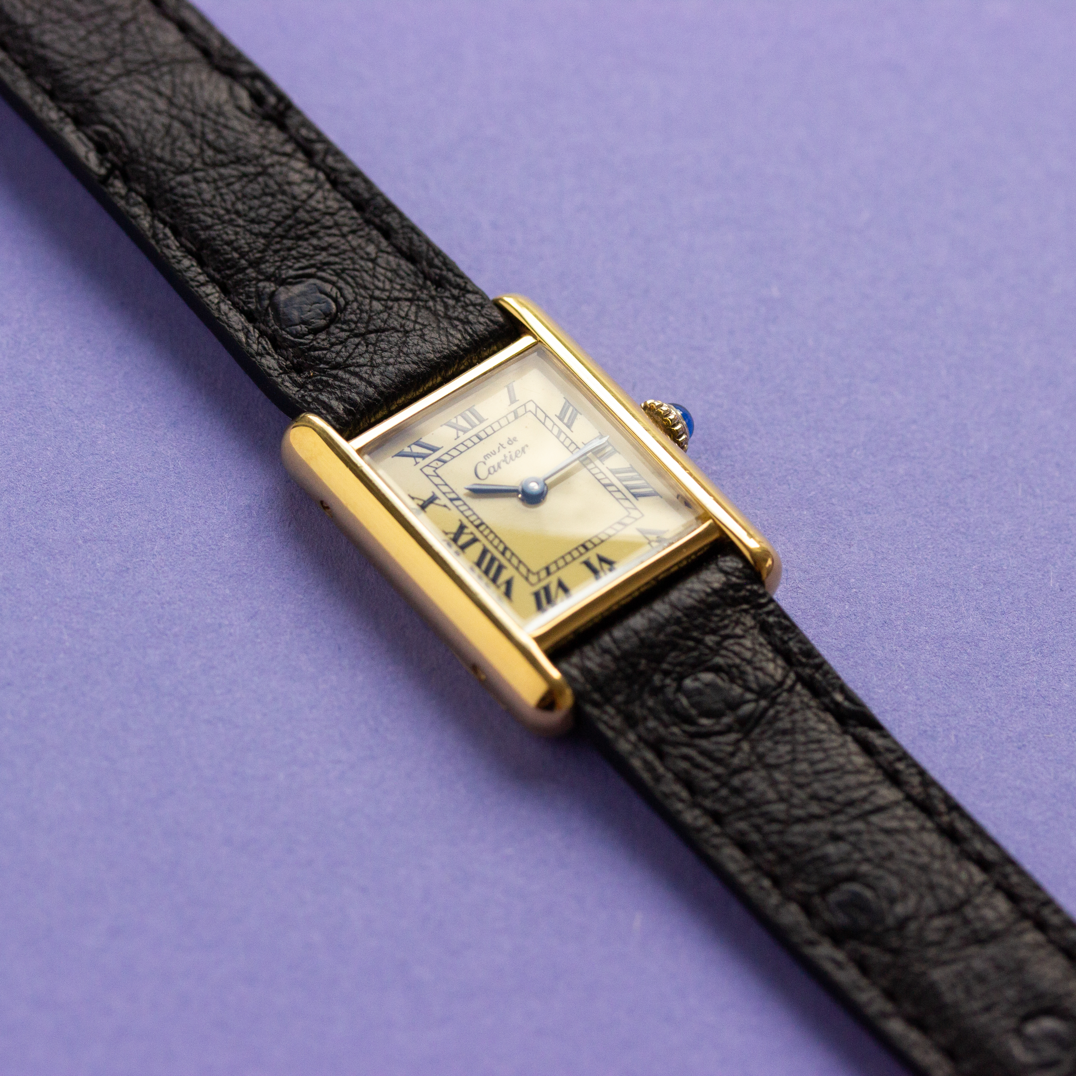View of Cartier Must de Tank Vermeil Roman Lemon Dial