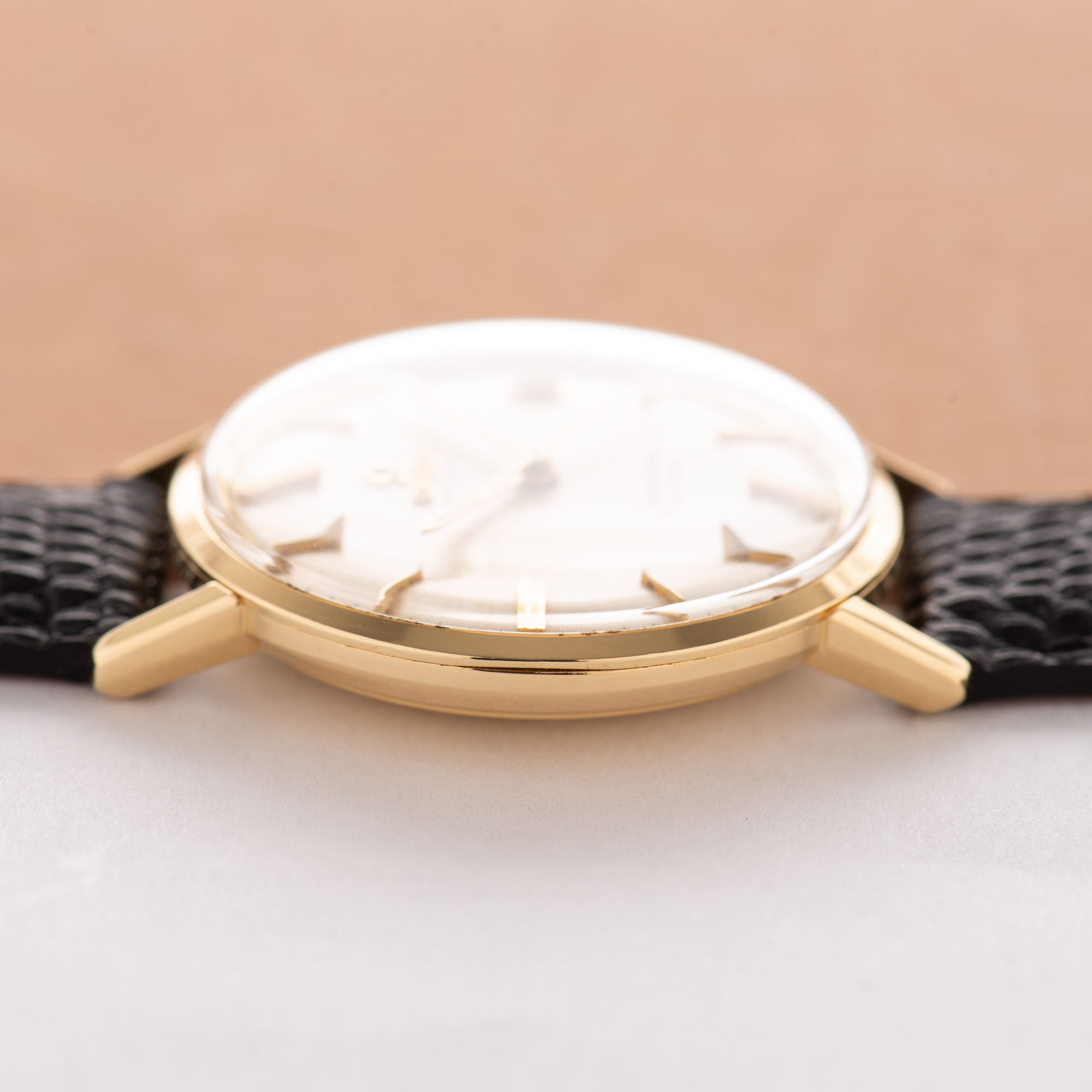 View of Omega Seamaster De Ville Date Automatic 18K Yellow Gold Ref 166,020 from 1962