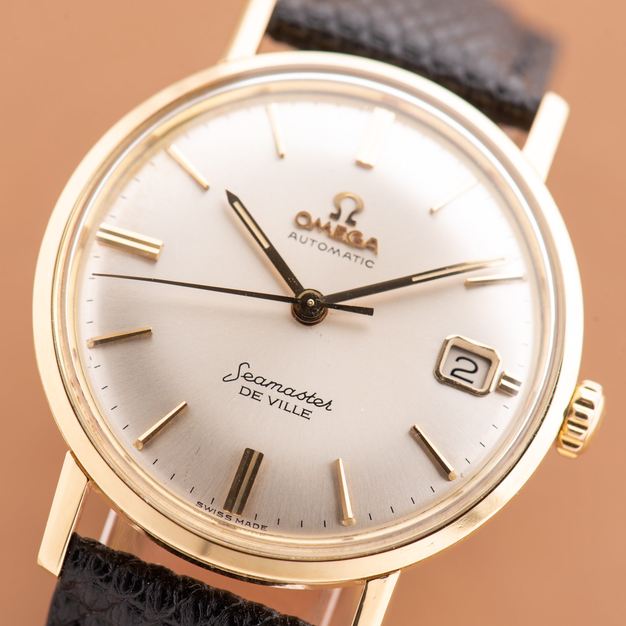 View of Omega Seamaster De Ville Date Automatic 18K Yellow Gold Ref 166,020 from 1962