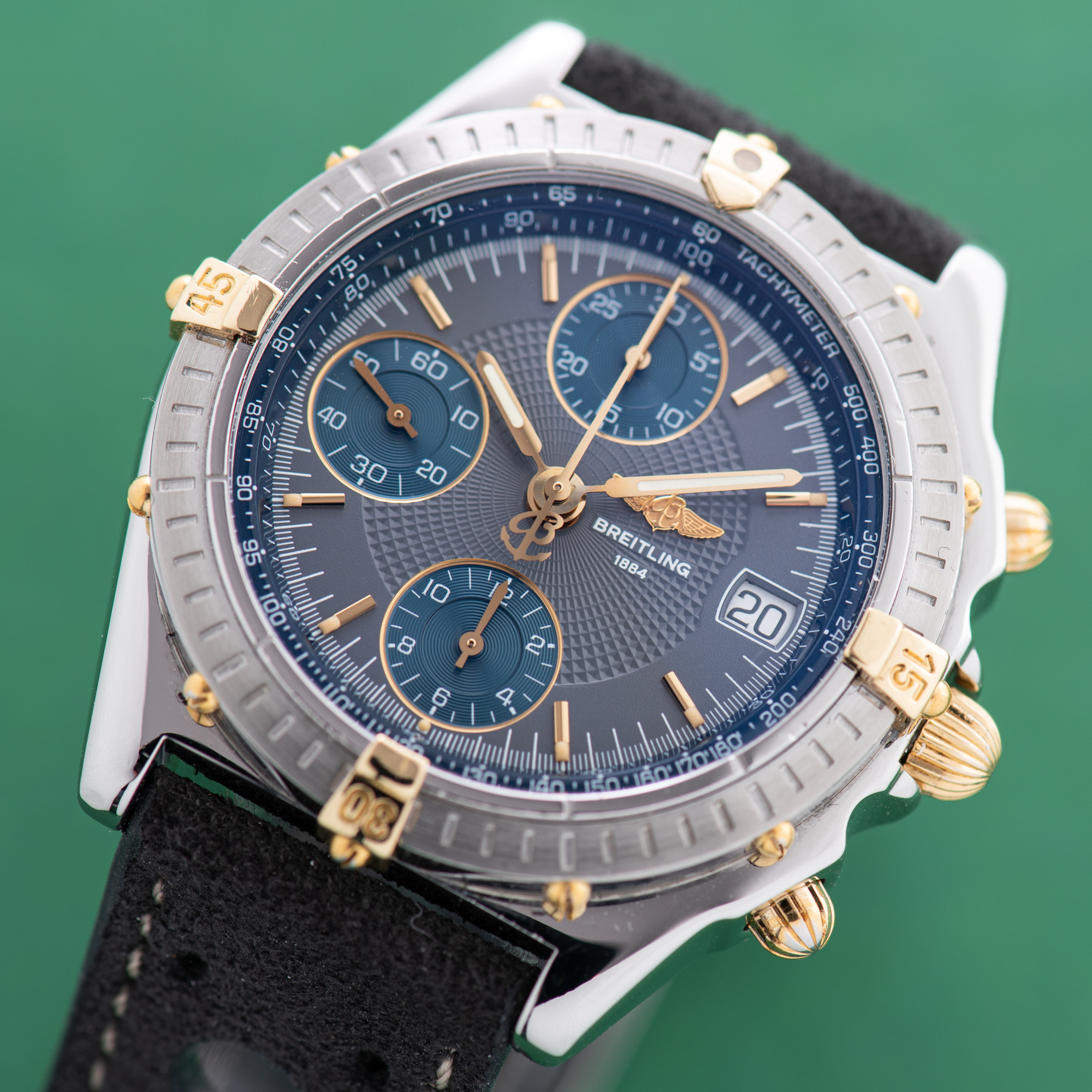 Zicht op Breitling Chronomat Gold/Staal Chronograph Grey / Blue dial Ref 13050.1