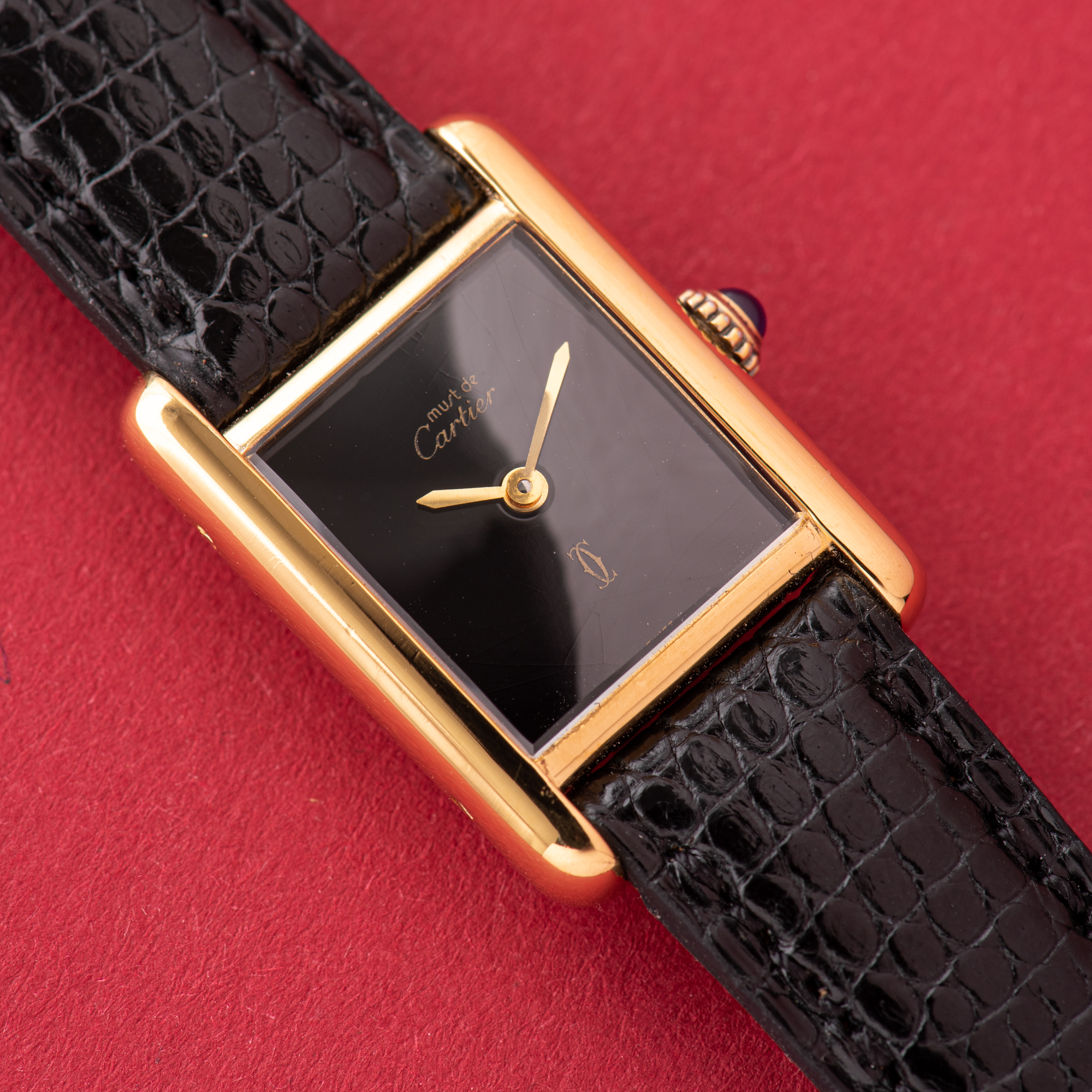 View of Cartier Must de Tank de Must Vermeil PM Onyx Black Spider Dial