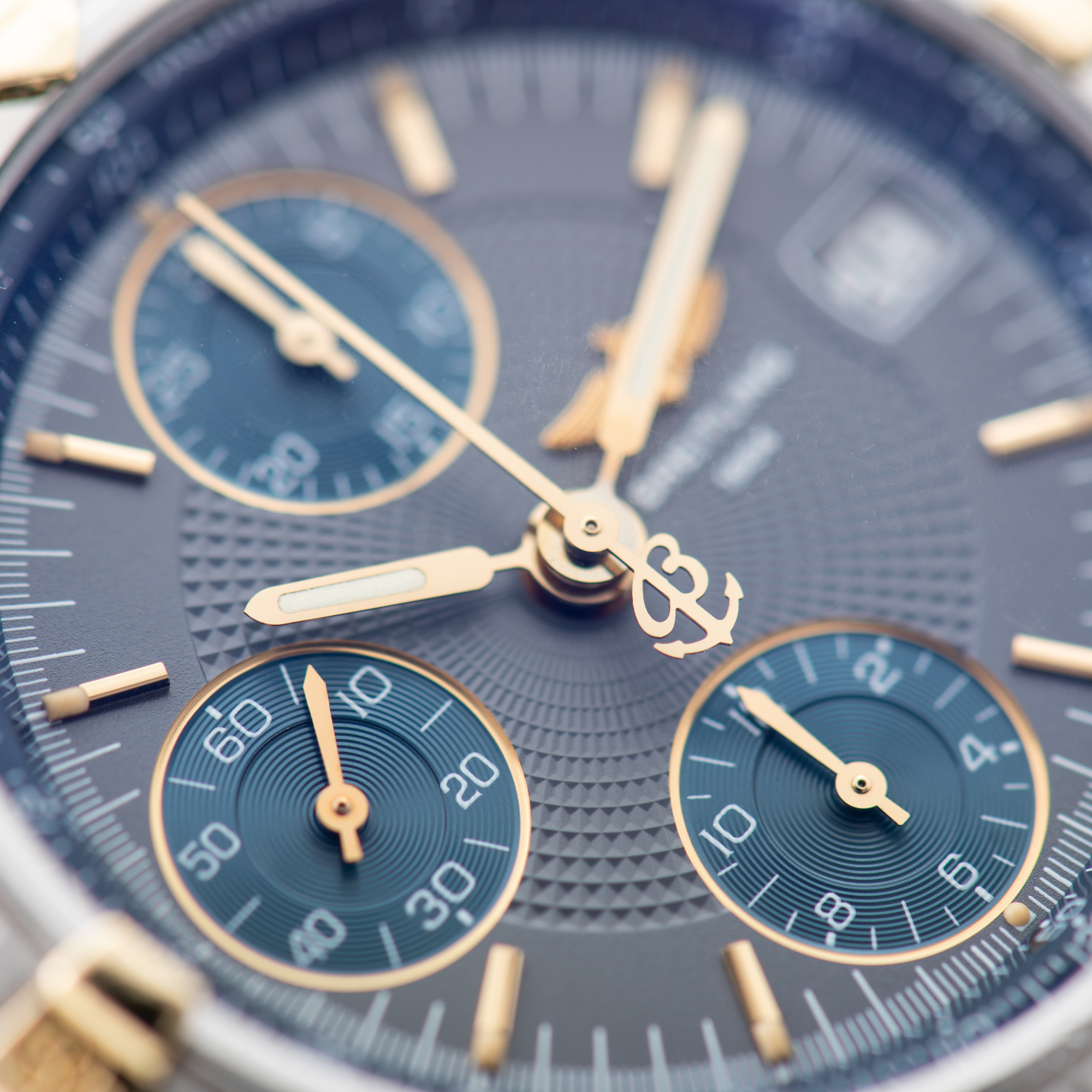 Zicht op Breitling Chronomat Gold/Staal Chronograph Grey / Blue dial Ref 13050.1