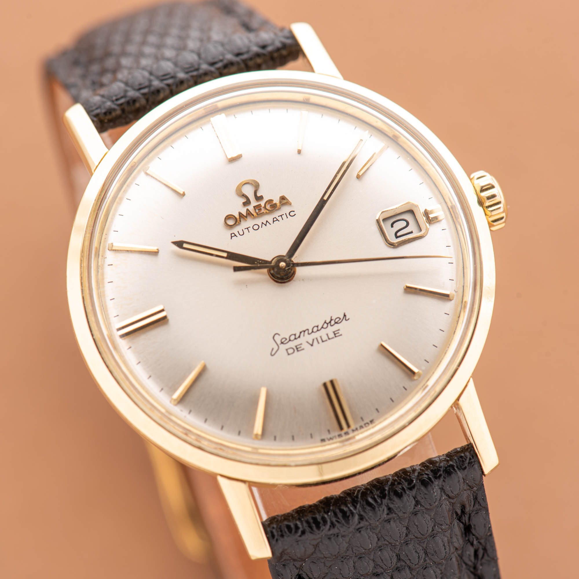 View of Omega Seamaster De Ville Date Automatic 18K Yellow Gold Ref 166,020 from 1962