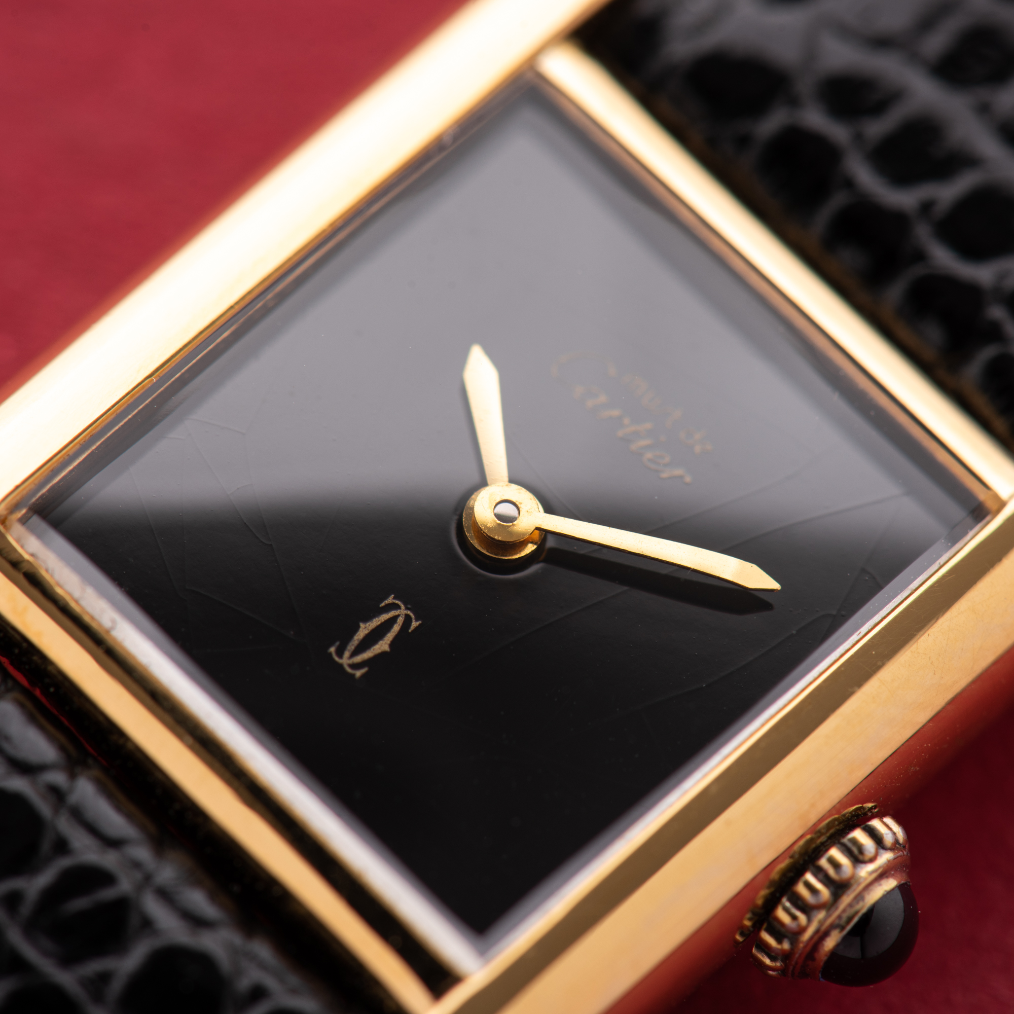 View of Cartier Must de Tank de Must Vermeil PM Onyx Black Spider Dial