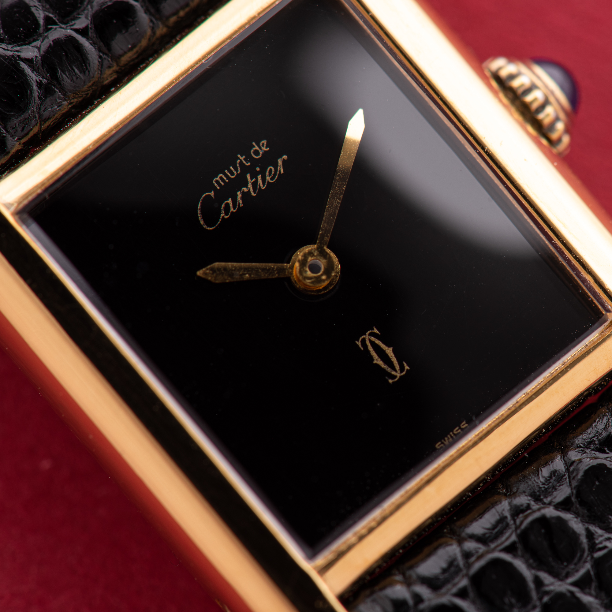 View of Cartier Must de Tank de Must Vermeil PM Onyx Black Spider Dial