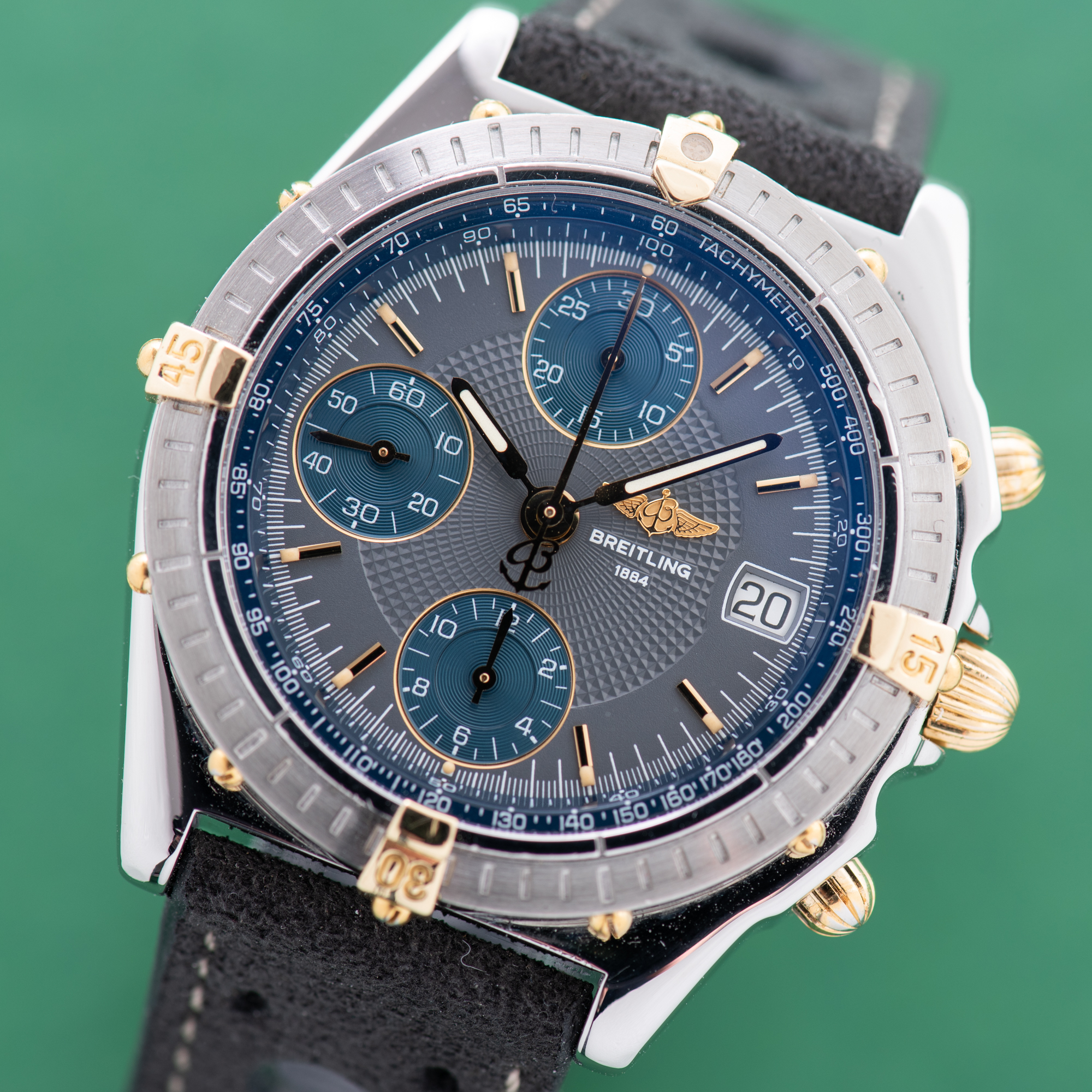 Zicht op Breitling Chronomat Gold/Staal Chronograph Grey / Blue dial Ref 13050.1