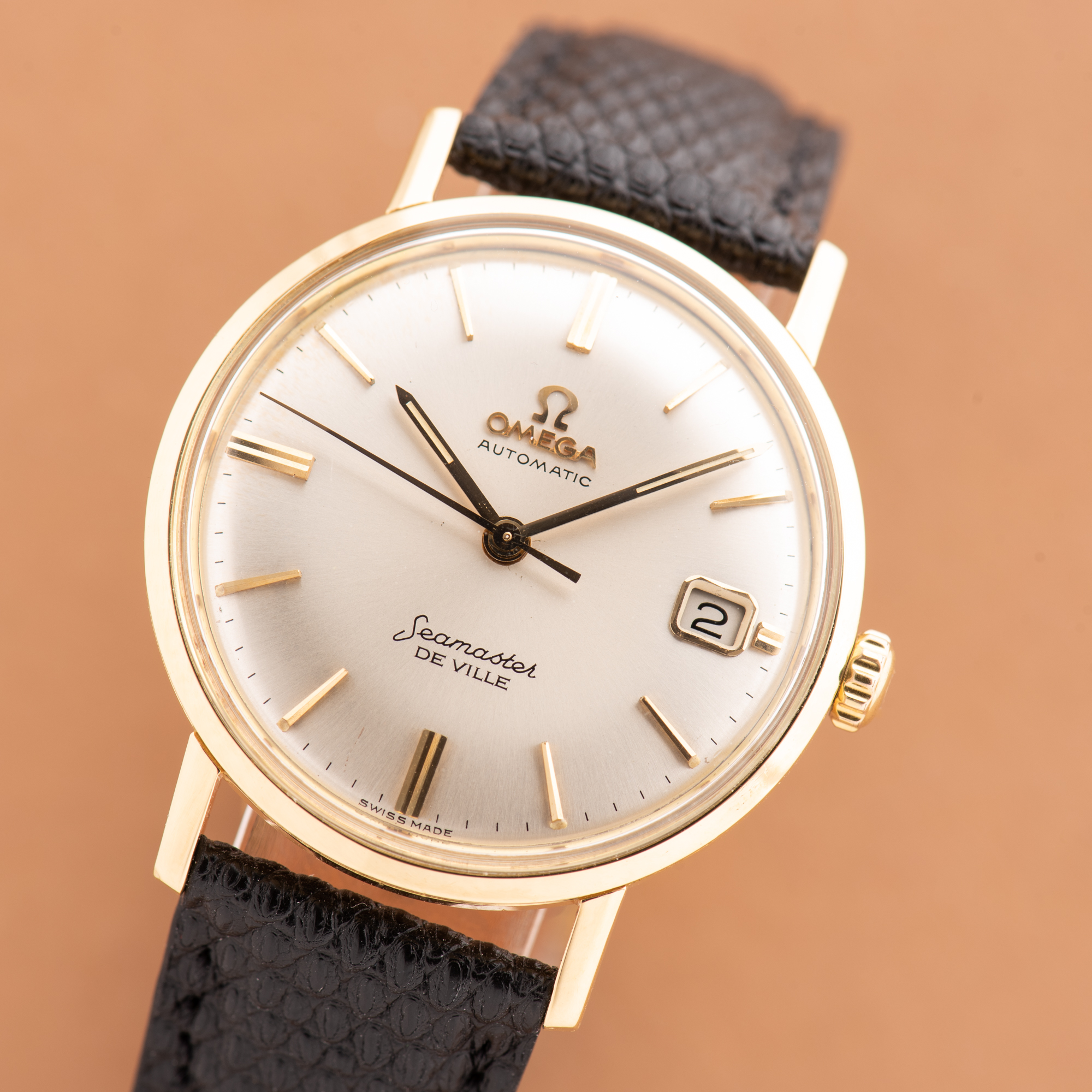 View of Omega Seamaster De Ville Date Automatic 18K Yellow Gold Ref 166,020 from 1962