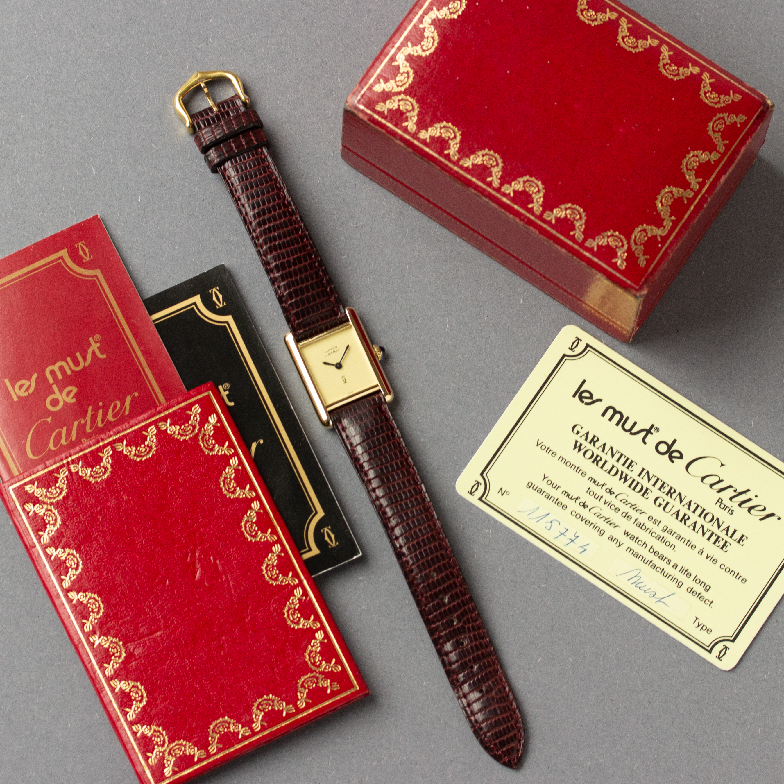 View of Cartier Tank Vermeil Full Set  Ivory Lemon Dial