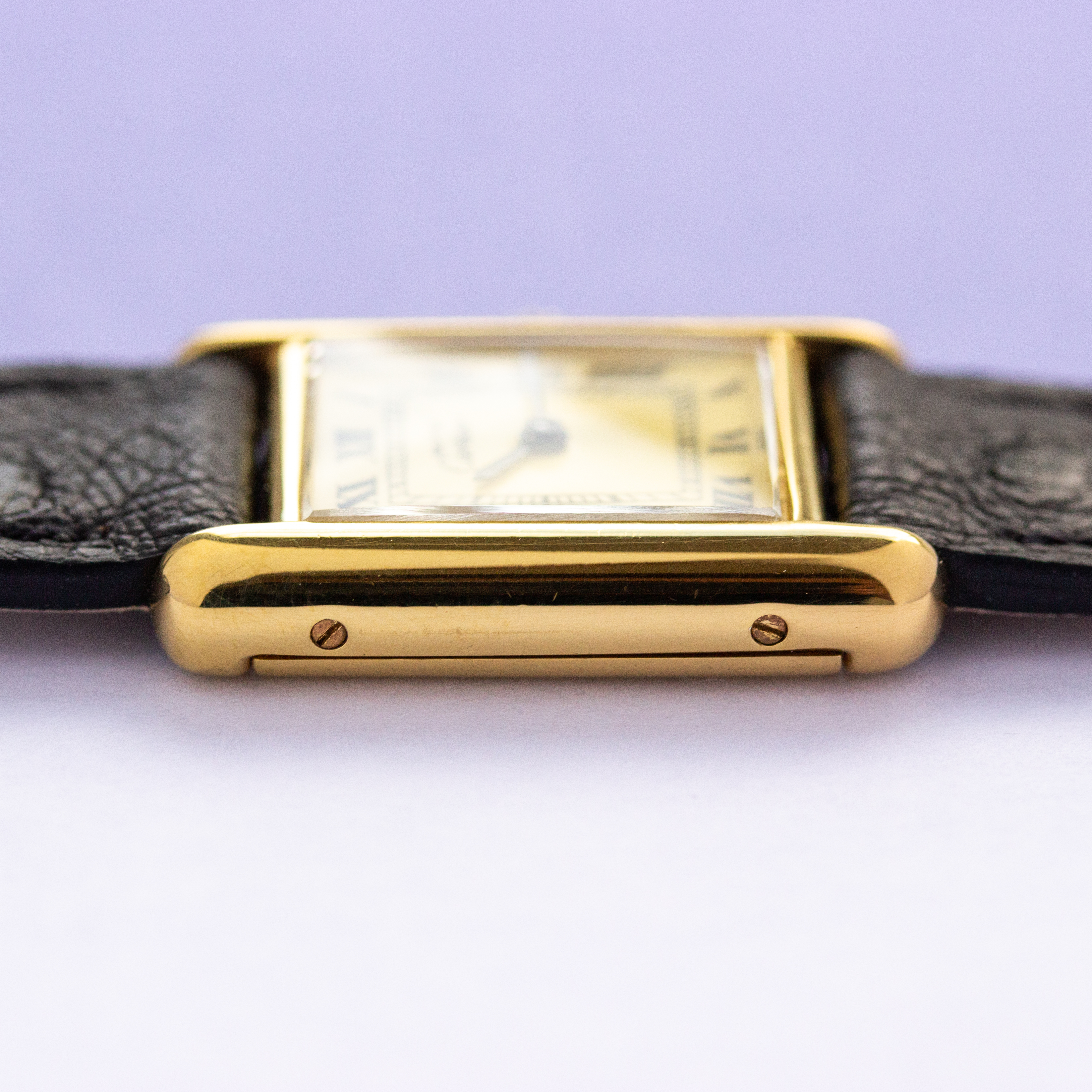 View of Cartier Must de Tank Vermeil Roman Lemon Dial