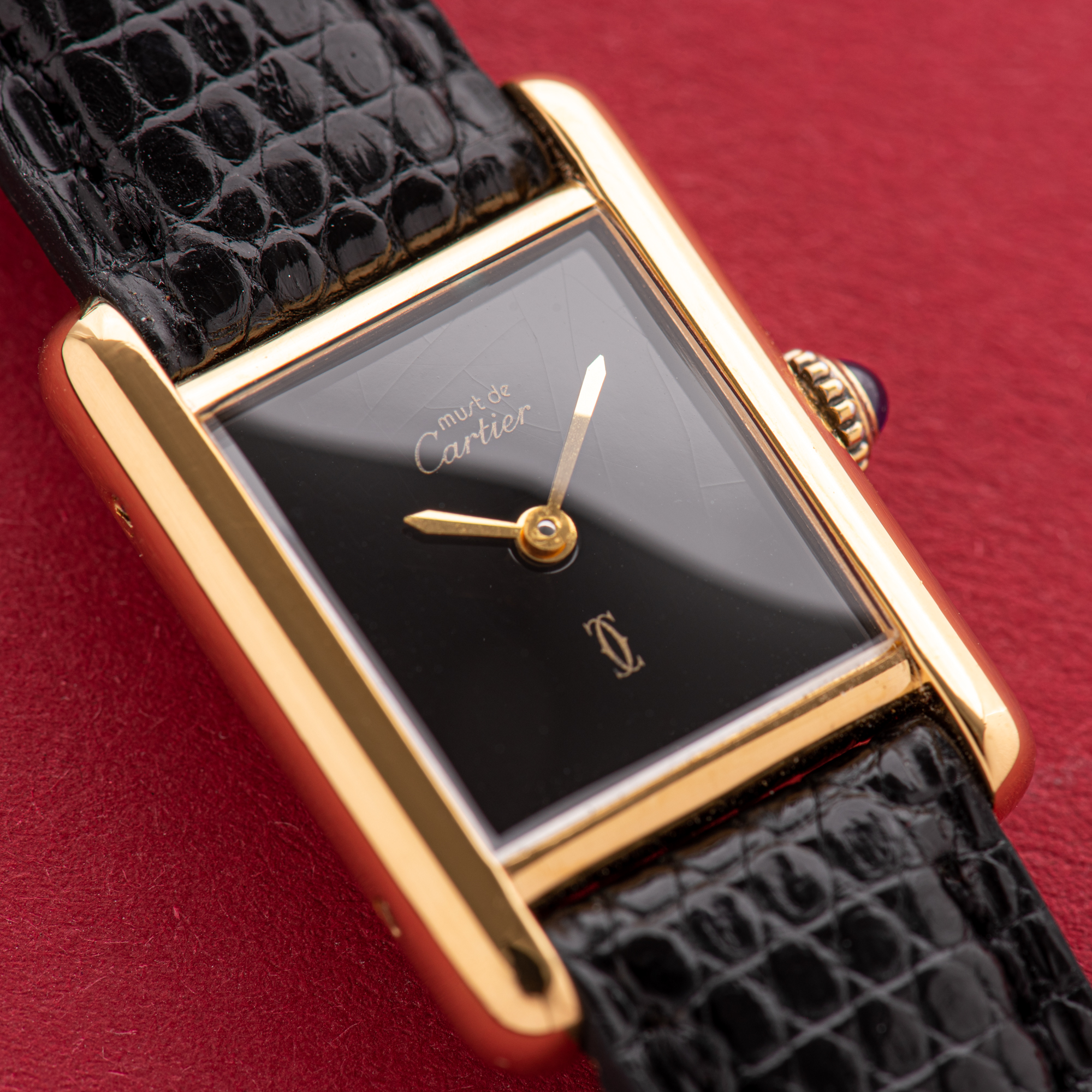 View of Cartier Must de Tank de Must Vermeil PM Onyx Black Spider Dial