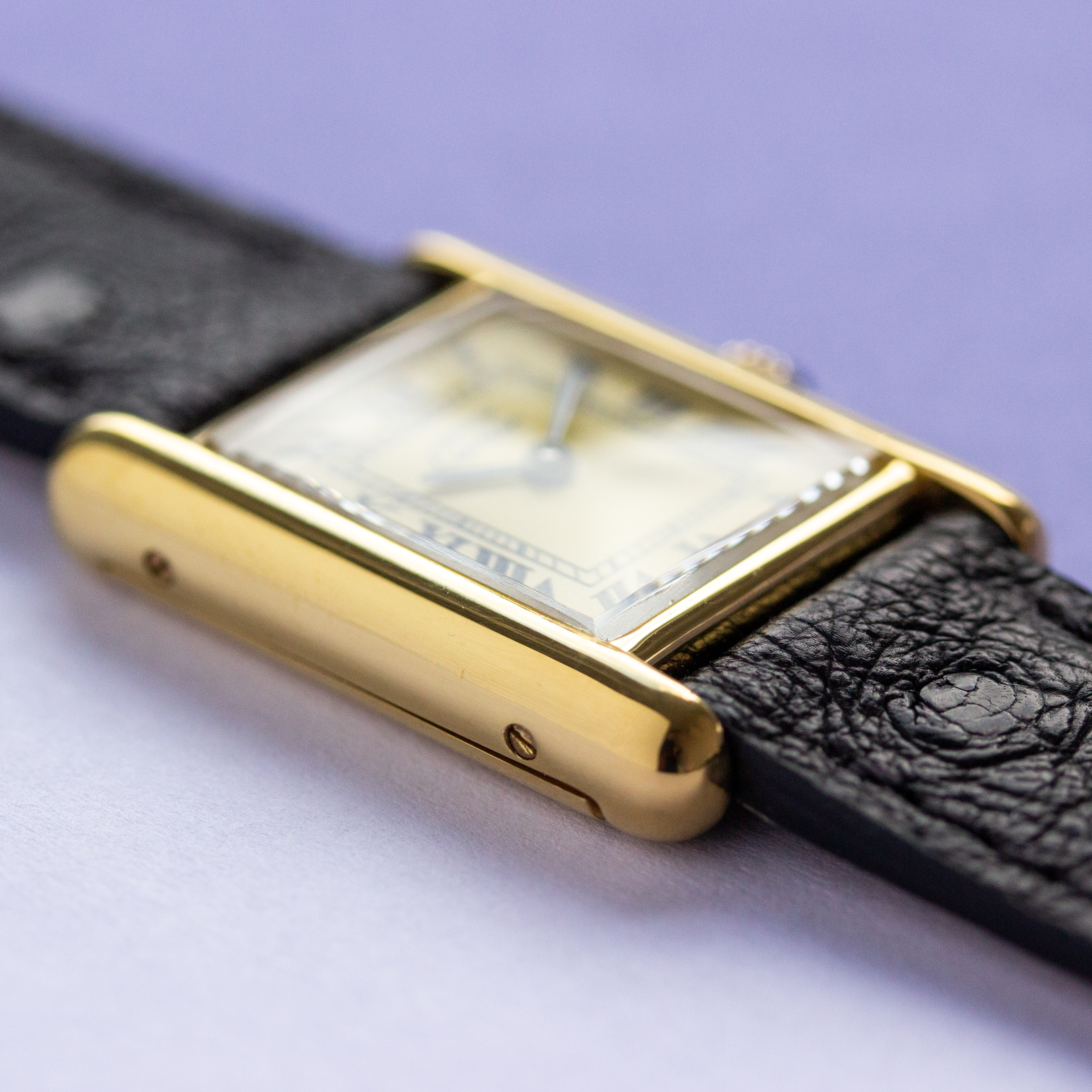 View of Cartier Must de Tank Vermeil Roman Lemon Dial