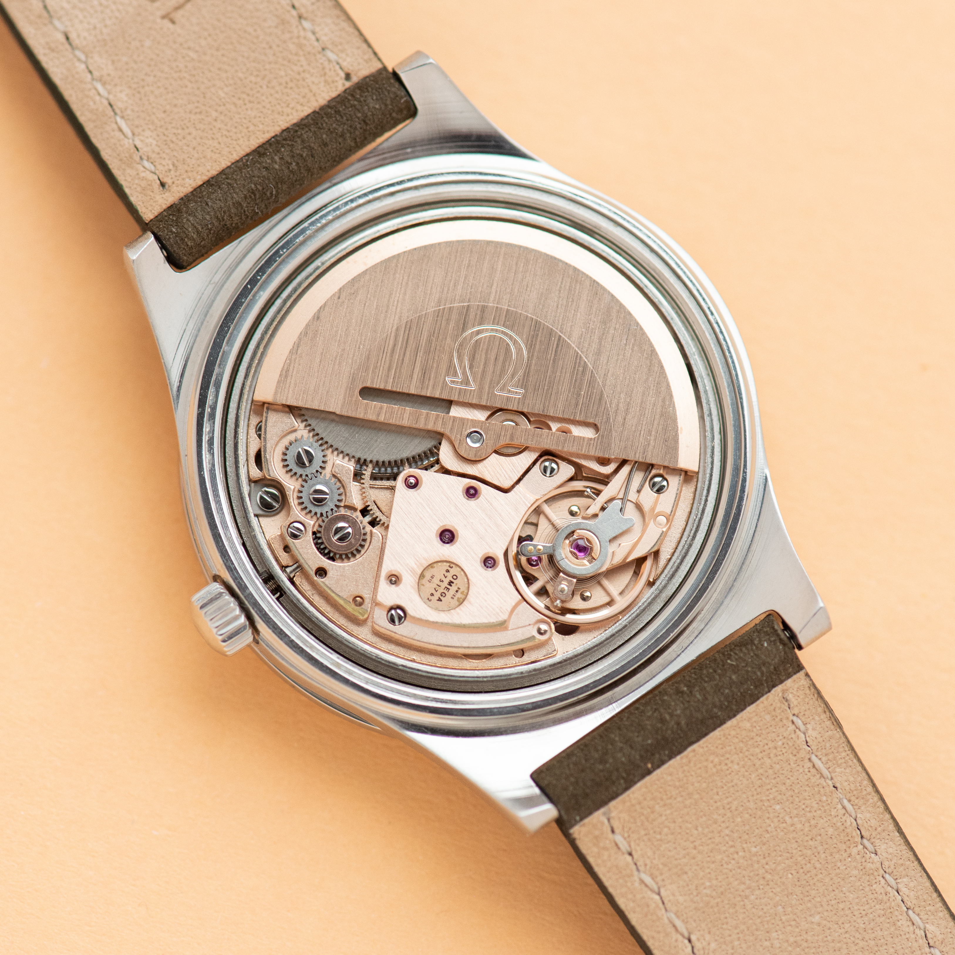 View of Omega Genève Automatic Date Breguet Dial Réf 166.0168 from 173