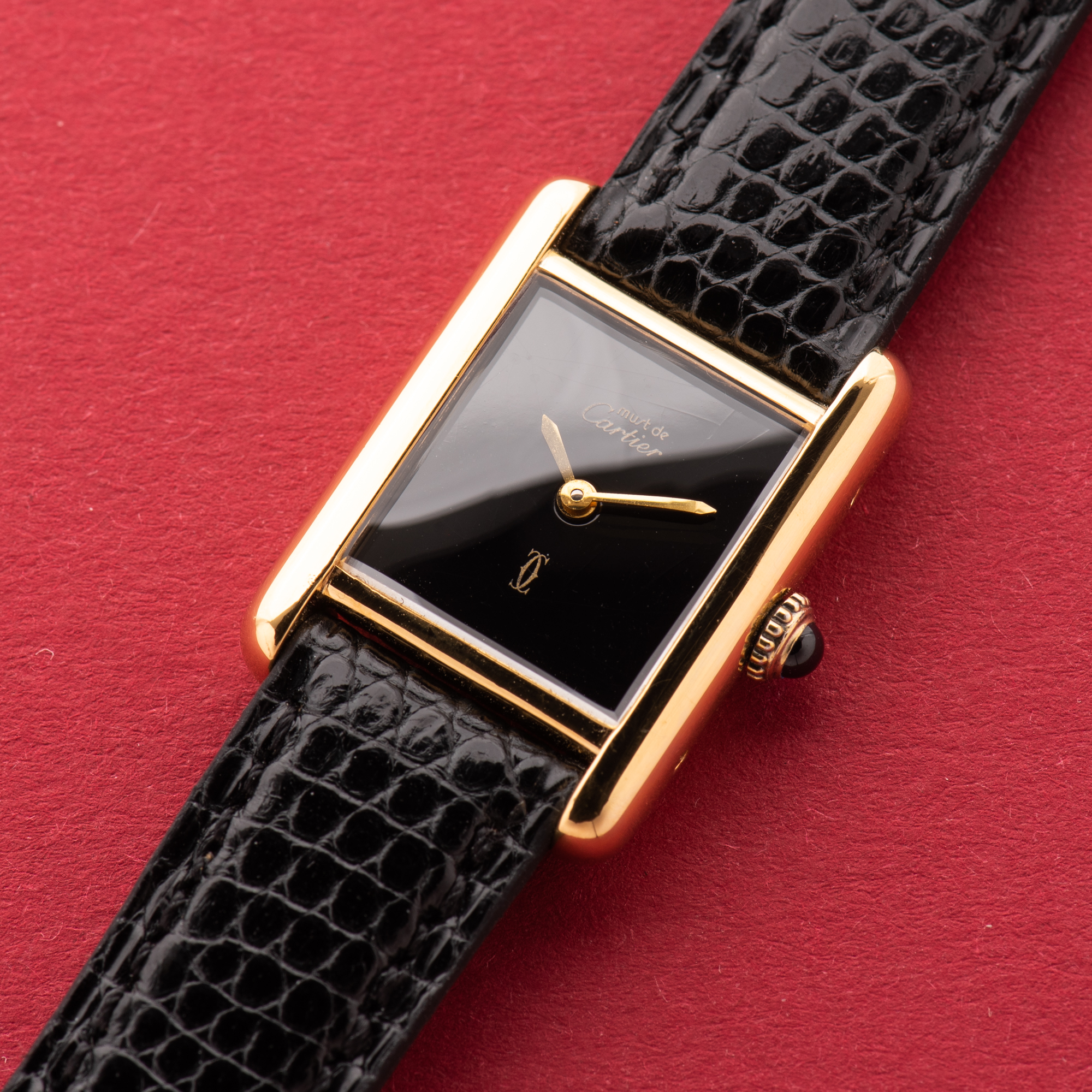 View of Cartier Must de Tank de Must Vermeil PM Onyx Black Spider Dial
