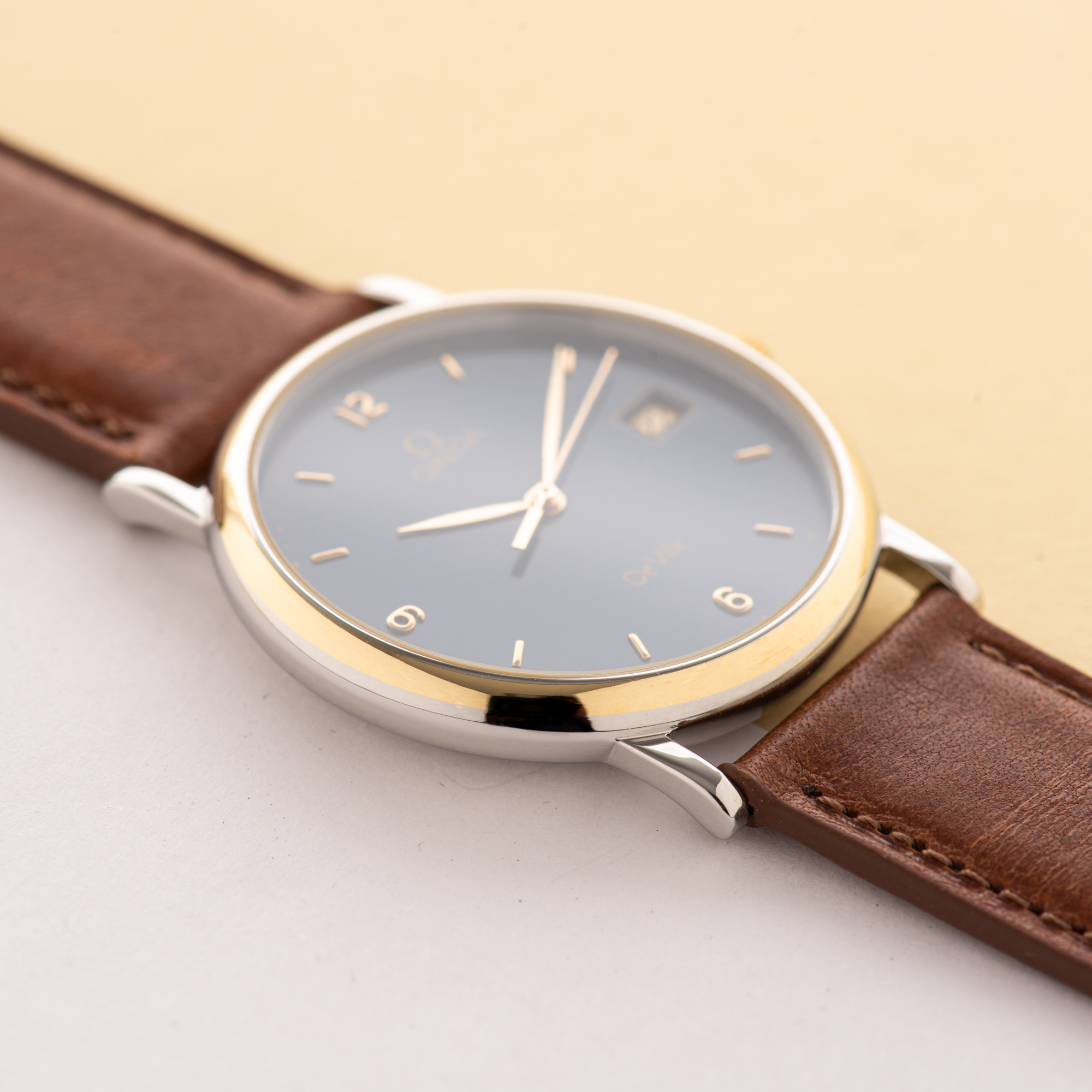 View of Omega de Ville Quartz Gold Steel Blue Dial Ref 196 2430
