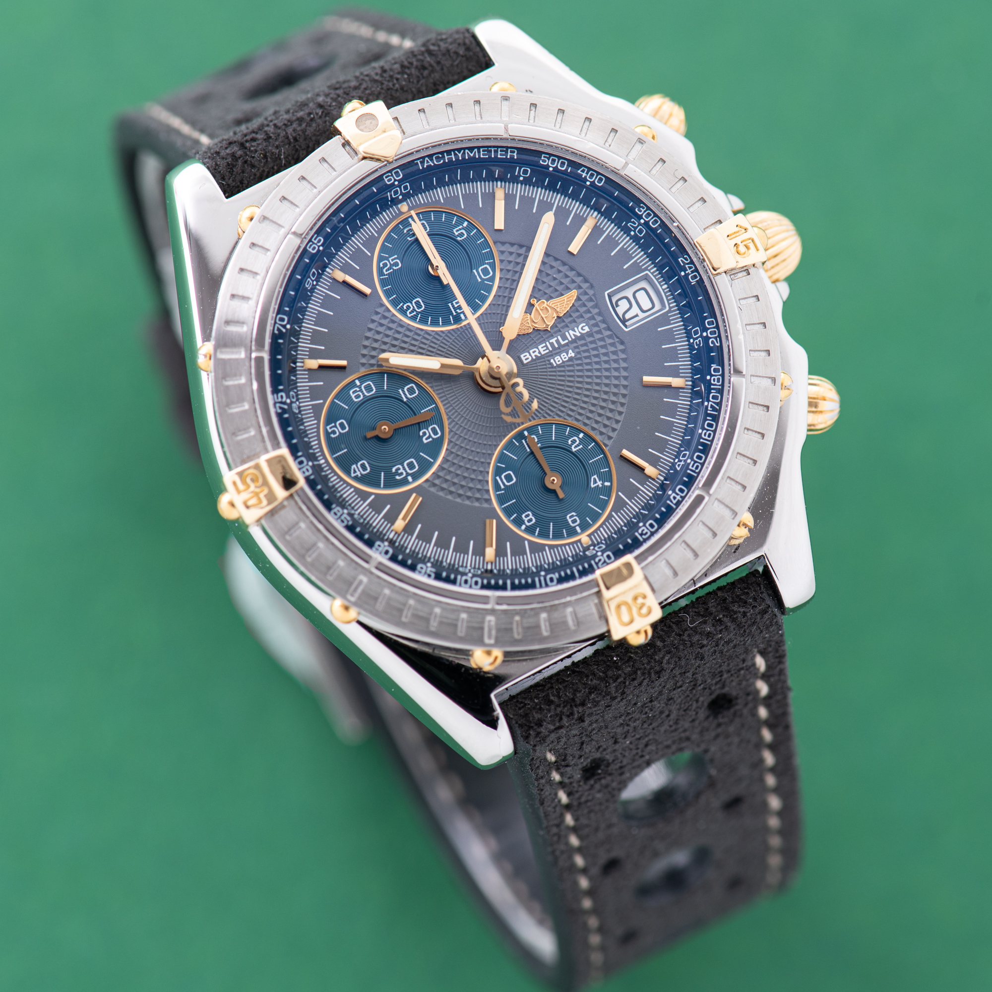 Zicht op Breitling Chronomat Gold/Staal Chronograph Grey / Blue dial Ref 13050.1