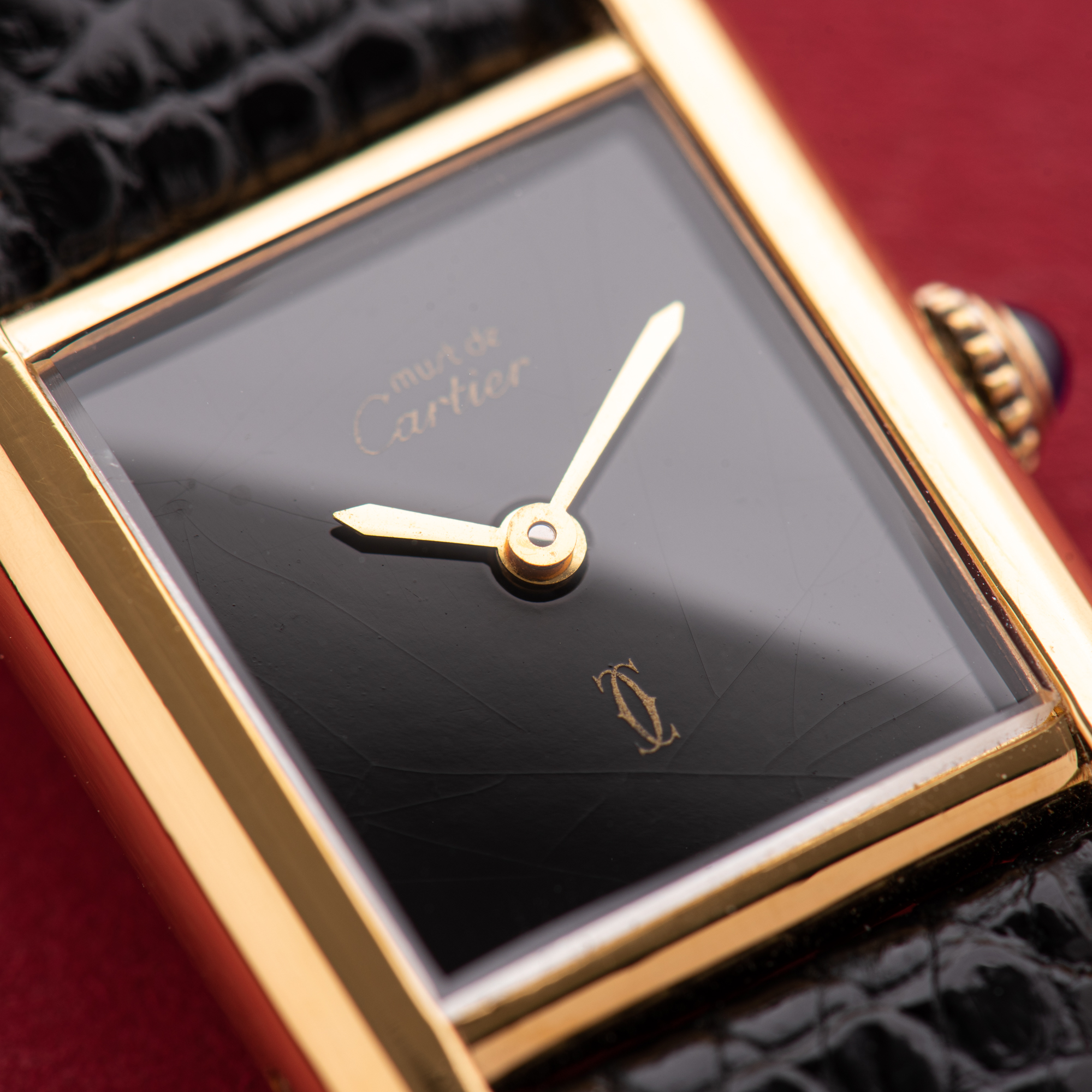 View of Cartier Must de Tank de Must Vermeil PM Onyx Black Spider Dial