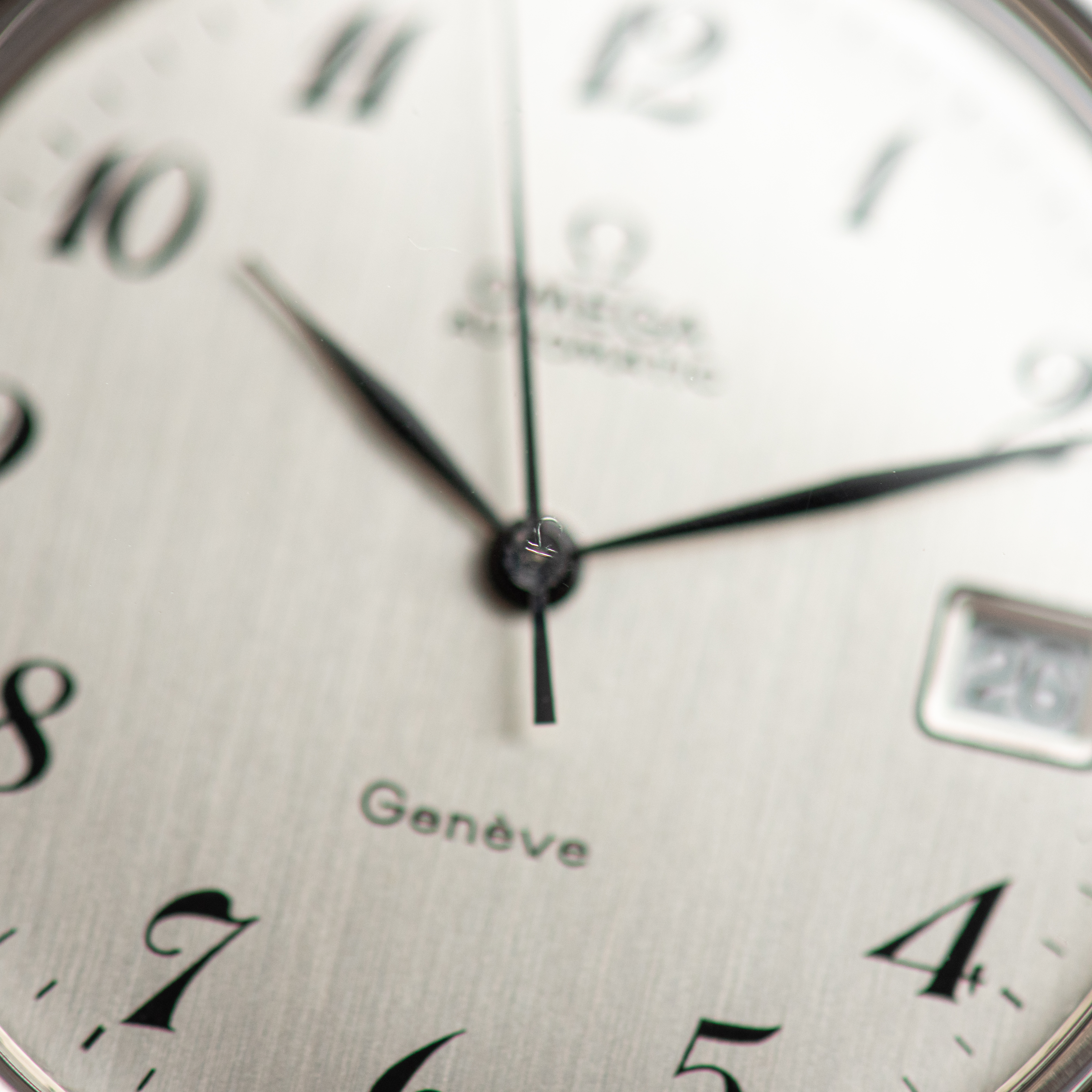 View of Omega Genève Automatic Date Breguet Dial Réf 166.0168 from 173