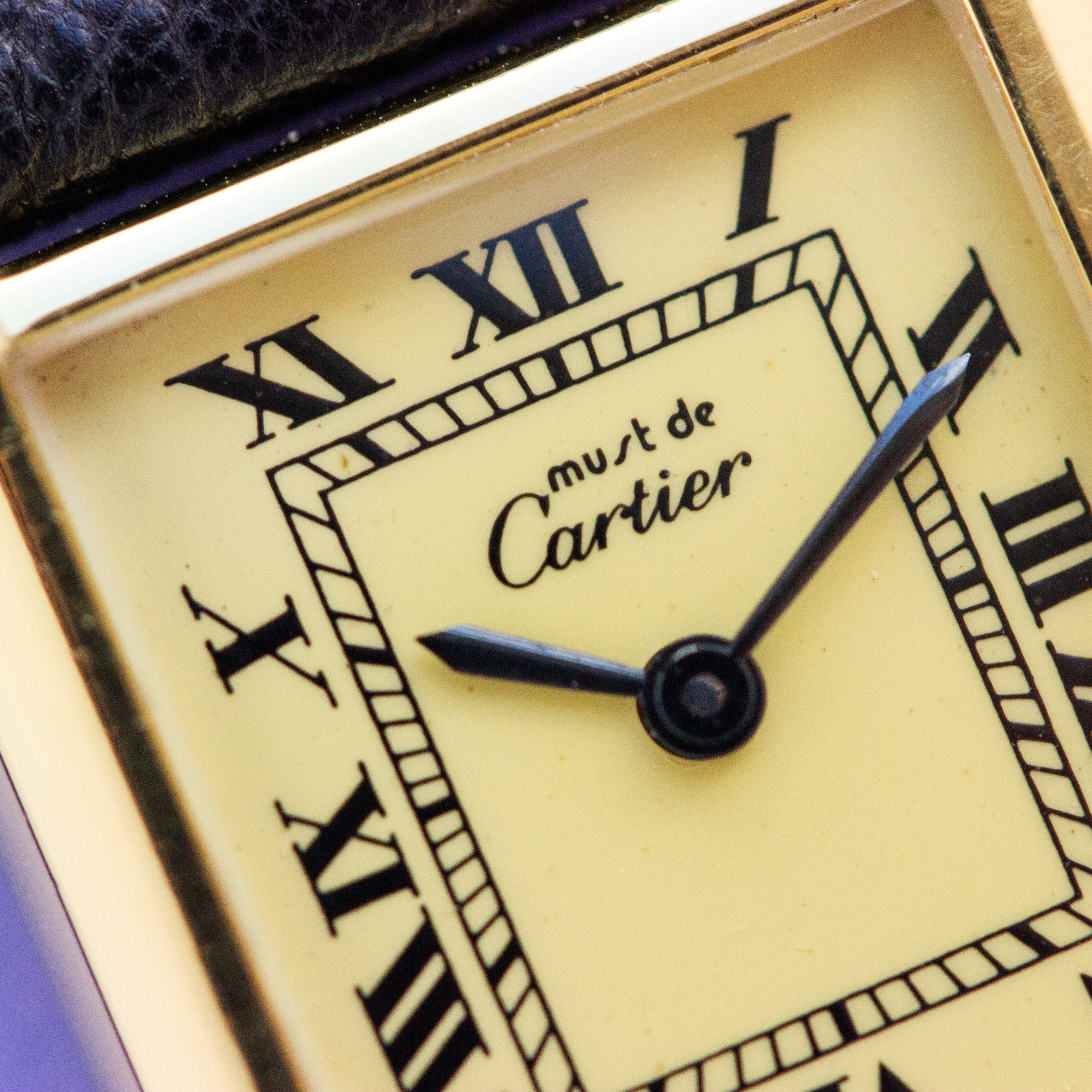 View of Cartier Must de Tank Vermeil Roman Lemon Dial