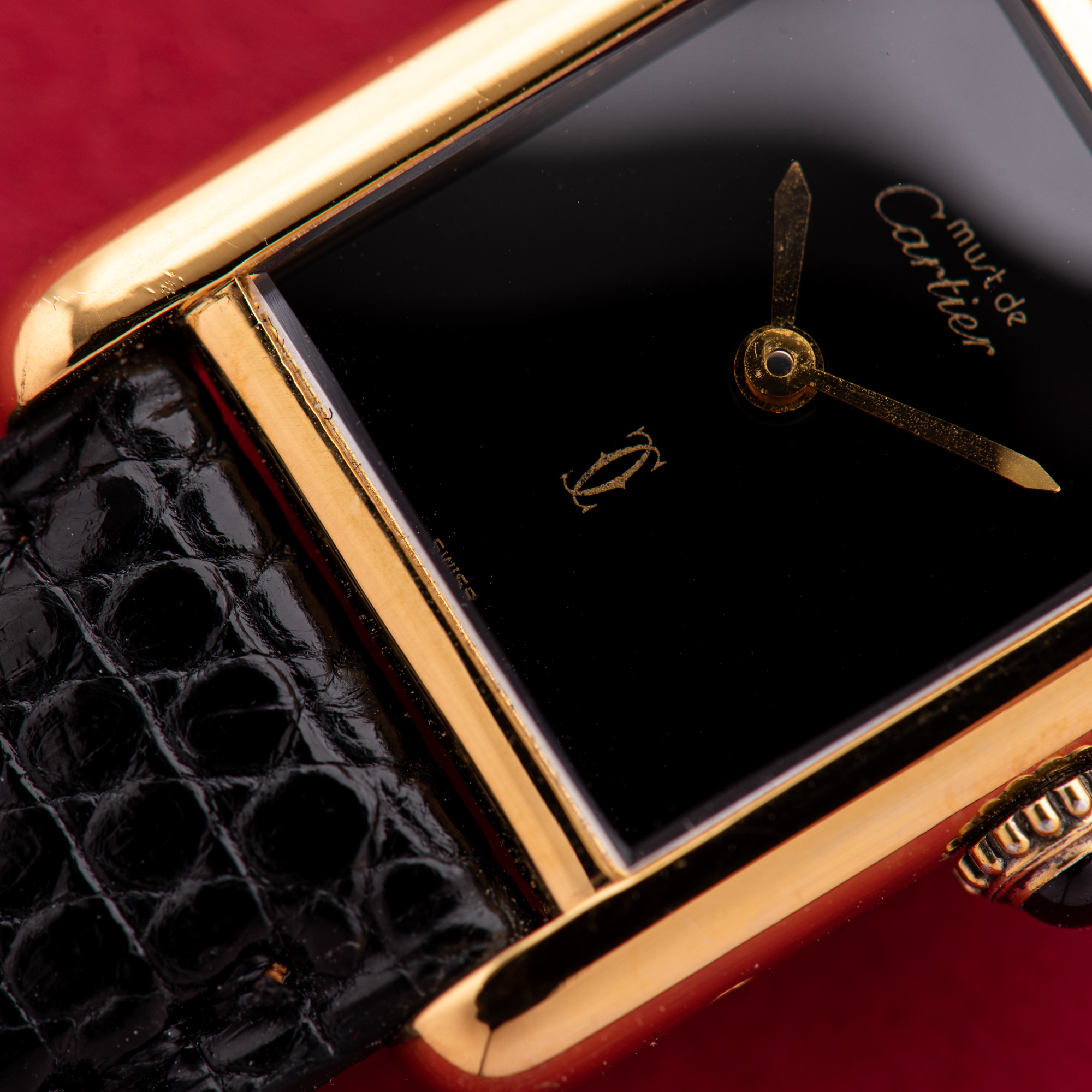 View of Cartier Must de Tank de Must Vermeil PM Onyx Black Spider Dial