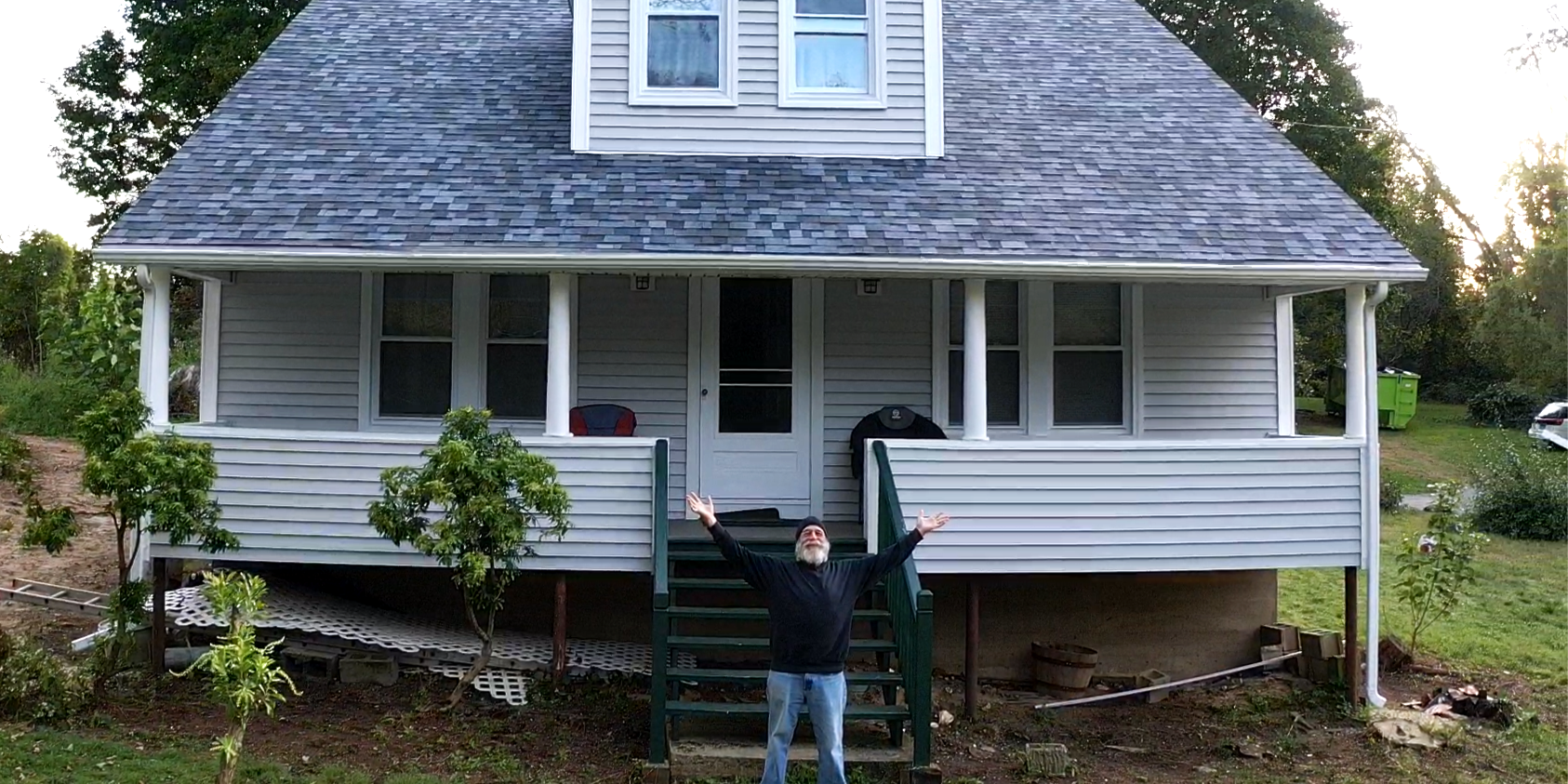 Professional Roof Installation – A team of experts installing a durable and weather-resistant roof on a residential home.