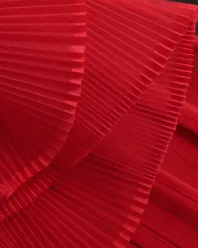 Thumbnail: Gegolfde jurk