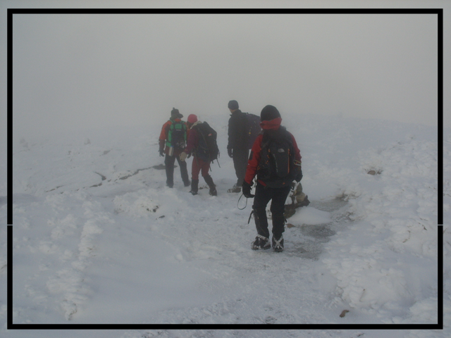 Nearing the summit of Algonquin Peak, Lake Placid in near whiteout conditions.