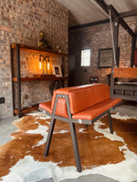 Leather bench in industrial-style room