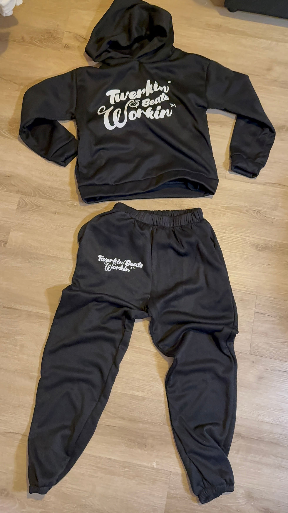 Thumbnail: Black Unisex Twerkin’ Beats Workin’ Peach design on front of hoodie Jogger